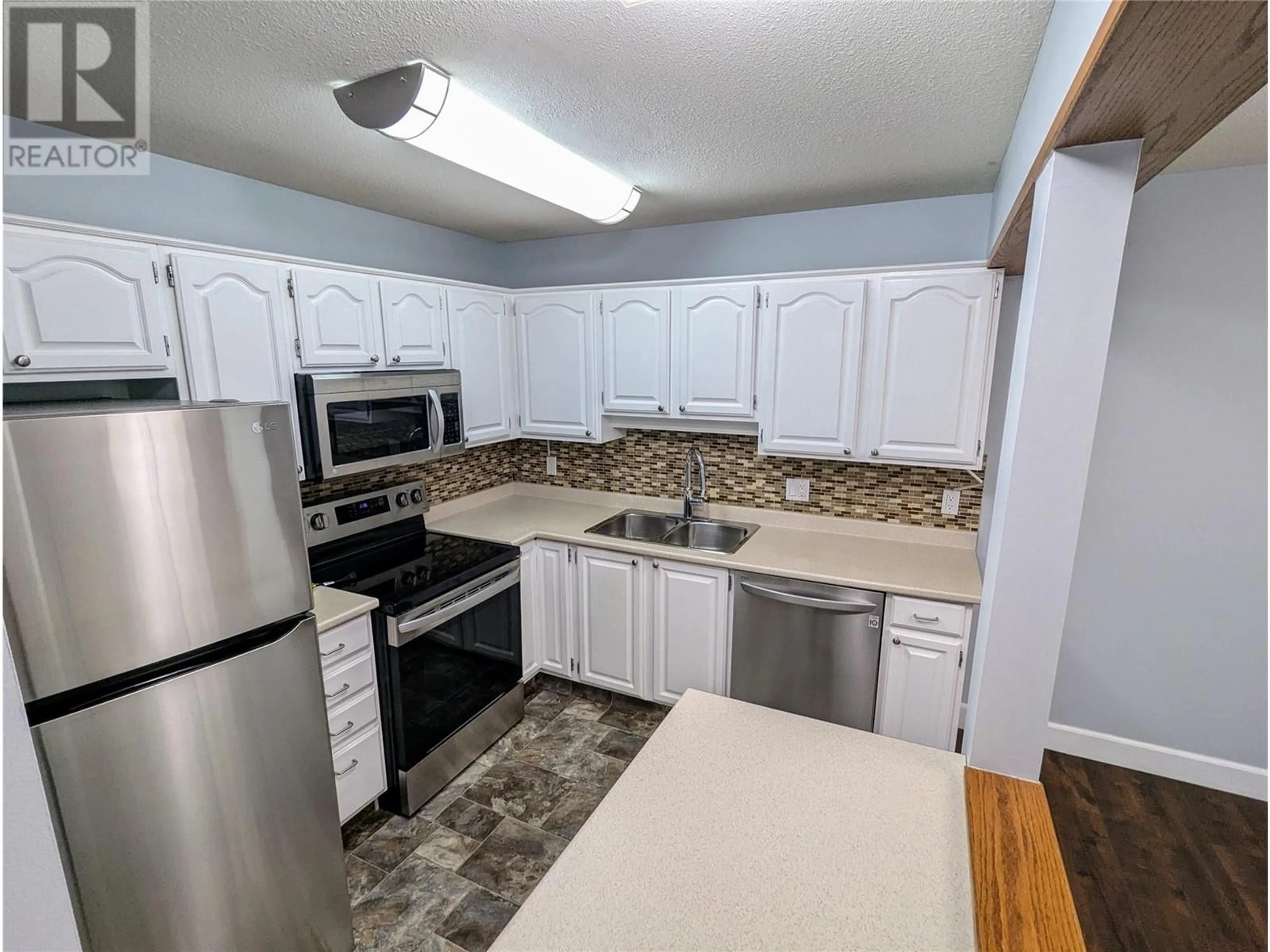 Standard kitchen, unknown for 1610 Gordon Drive Unit# 206, Kelowna British Columbia V1Y3G9