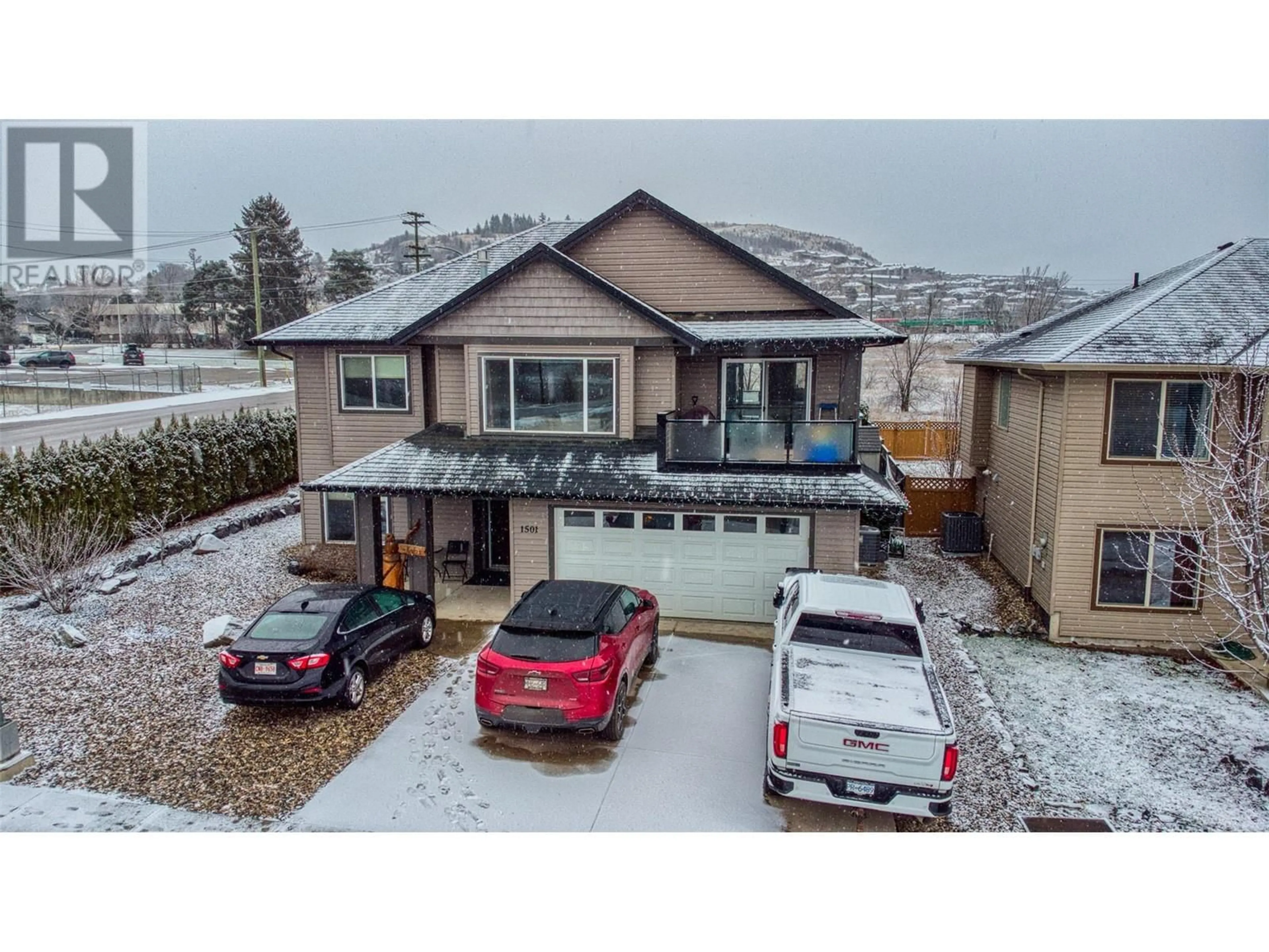 A pic from outside/outdoor area/front of a property/back of a property/a pic from drone, street for 1501 15th Avenue, Vernon British Columbia V1T9R4