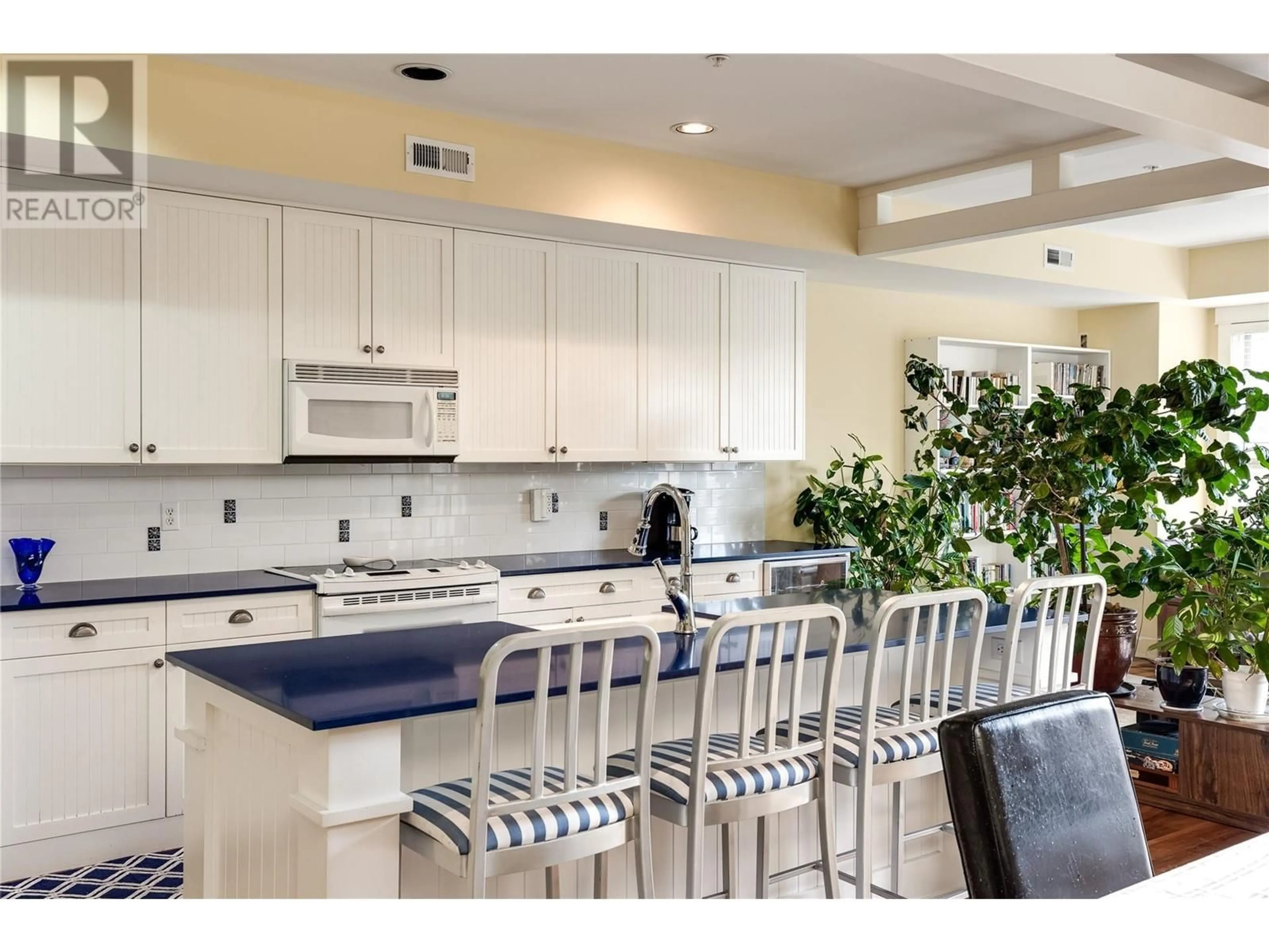 Open concept kitchen, ceramic/tile floor for 524 - 3880 TRUSWELL ROAD, Kelowna British Columbia V1W5A2