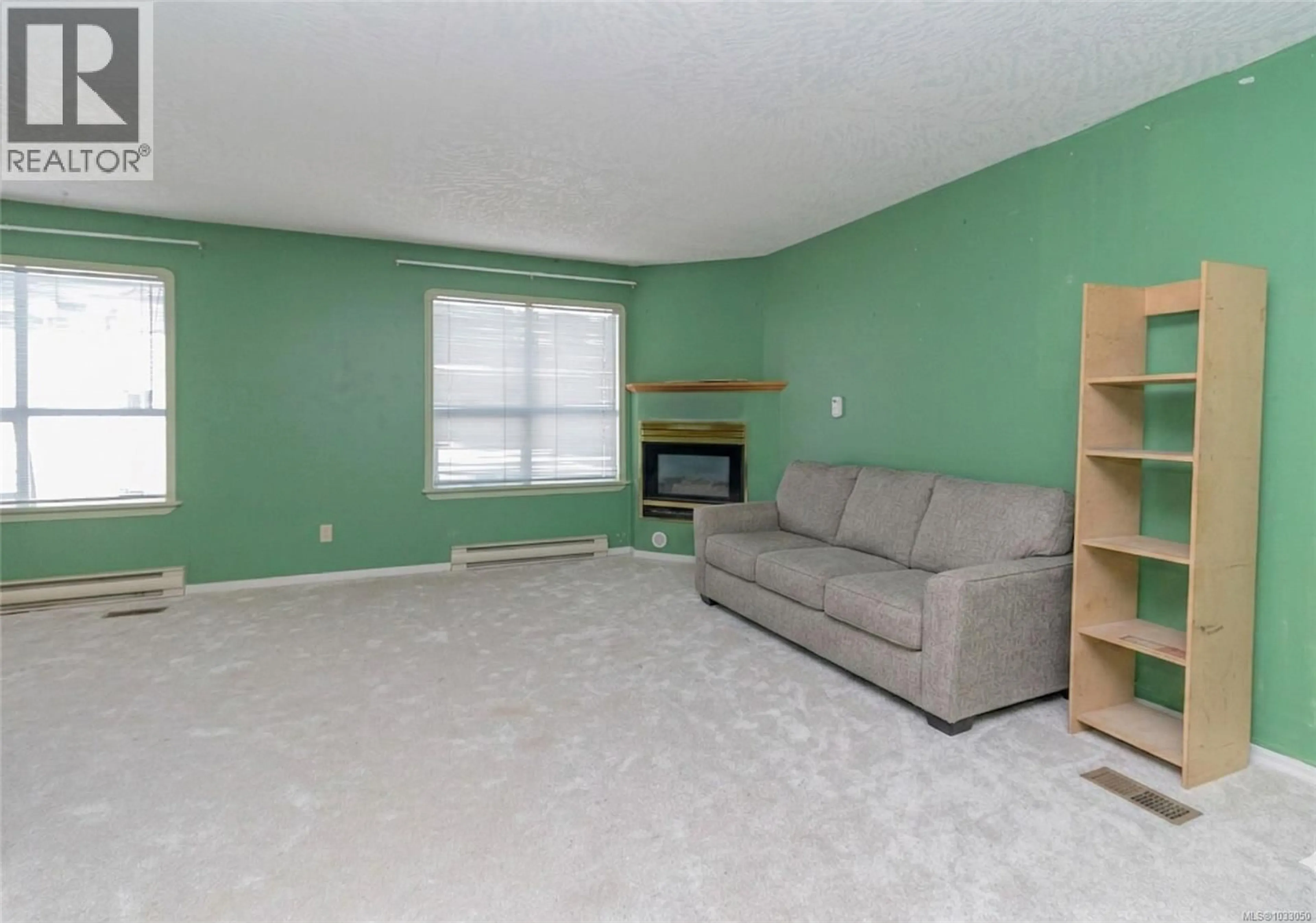 Living room with furniture, unknown for 402 - 832 FISGARD STREET, Victoria British Columbia V8W1S1
