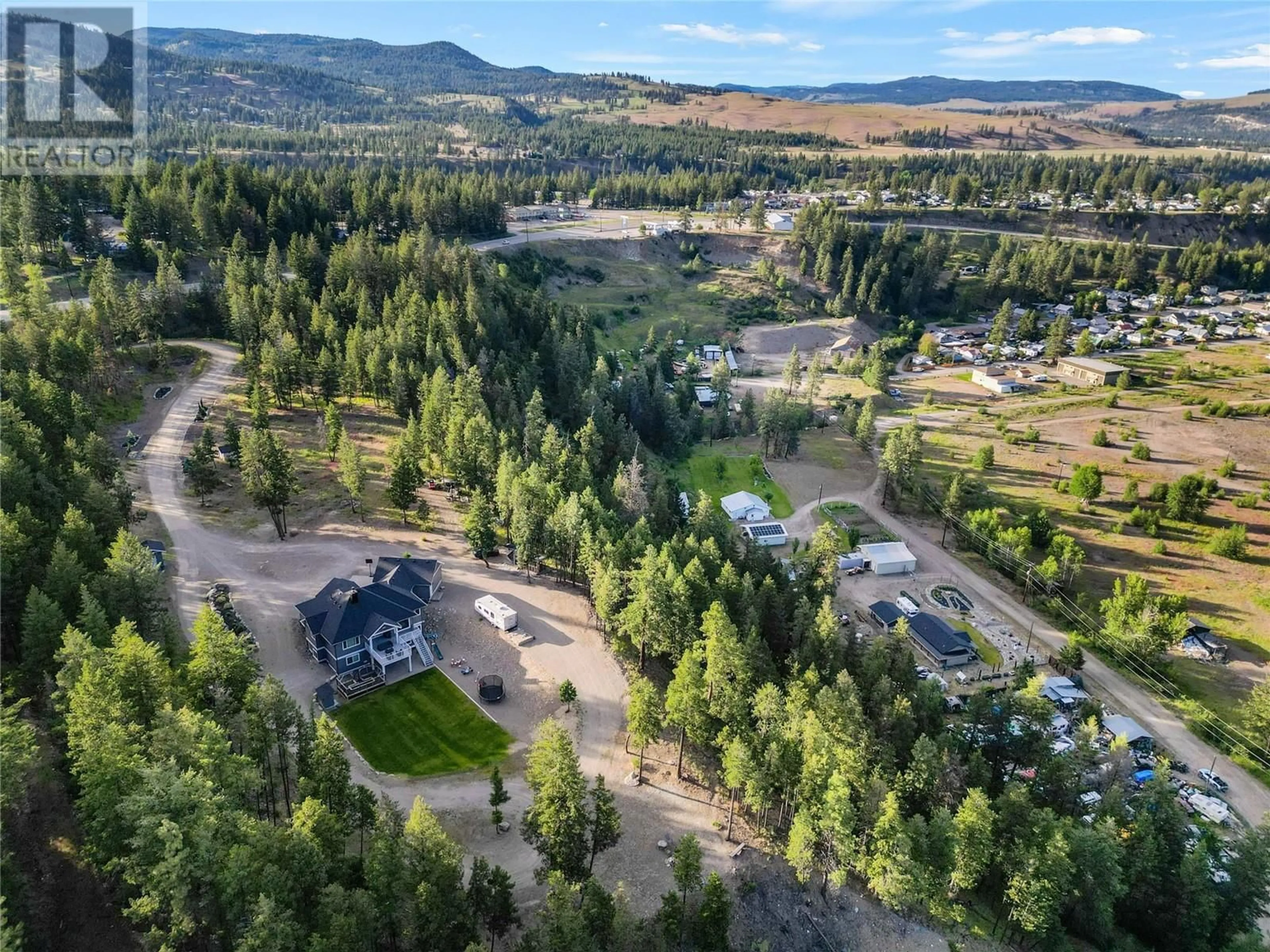 A pic from outside/outdoor area/front of a property/back of a property/a pic from drone, mountain view for 2-640 HWY 3, Princeton British Columbia V0X1W0