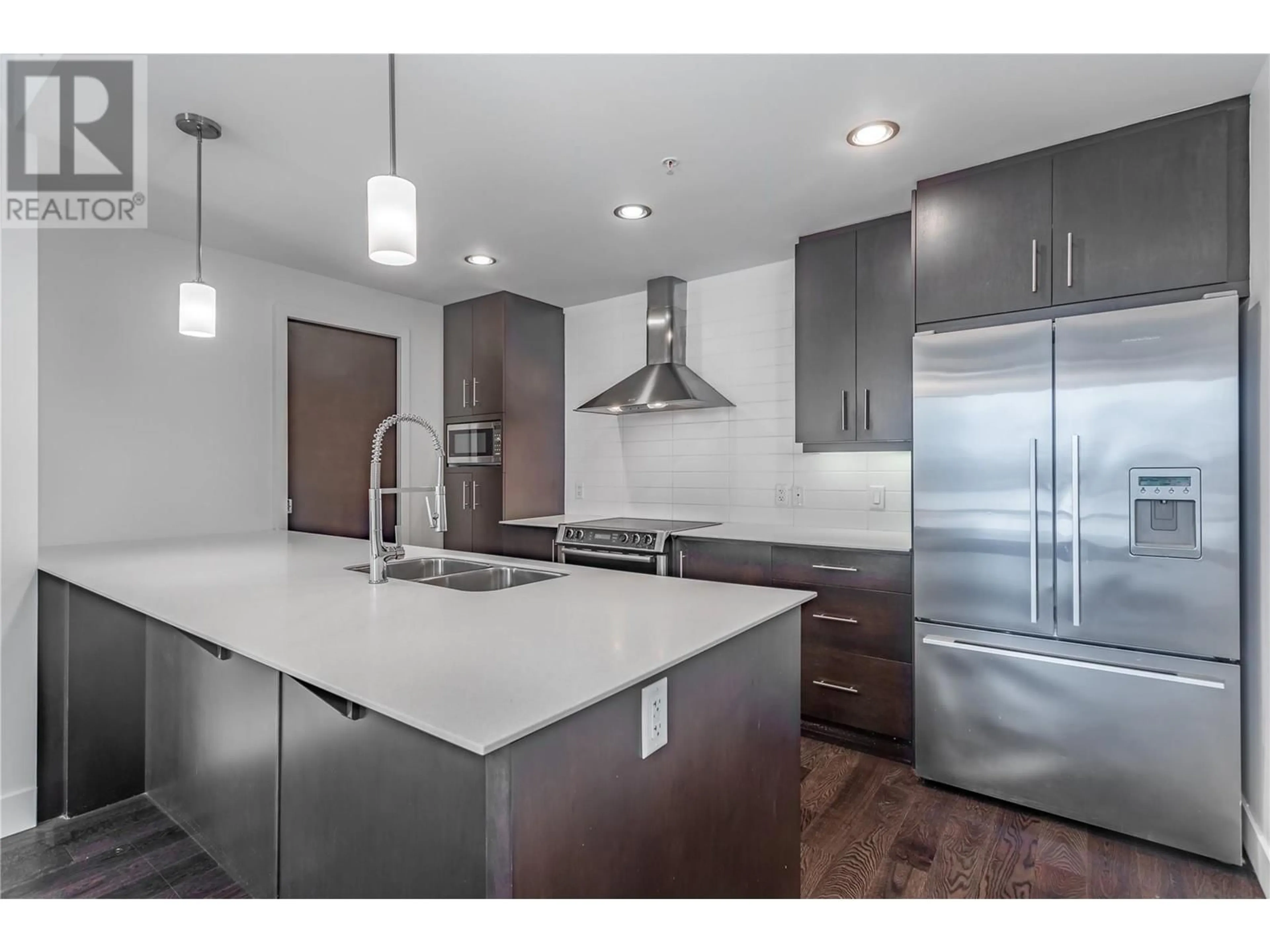 Open concept kitchen, unknown for 2040 Springfield Road Unit# 904, Kelowna British Columbia V1Y9N7