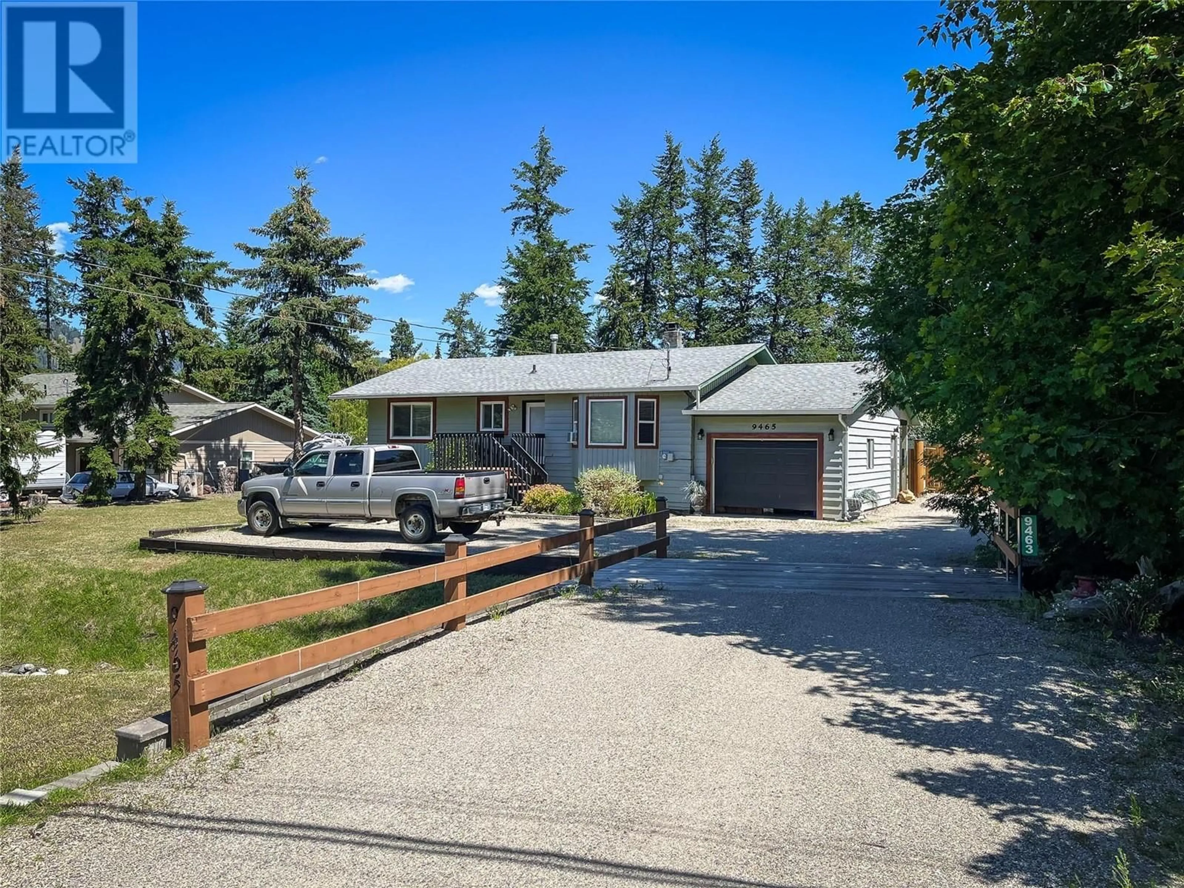 A pic from outside/outdoor area/front of a property/back of a property/a pic from drone, street for 9465 Angus Drive, Coldstream British Columbia V1T5M2