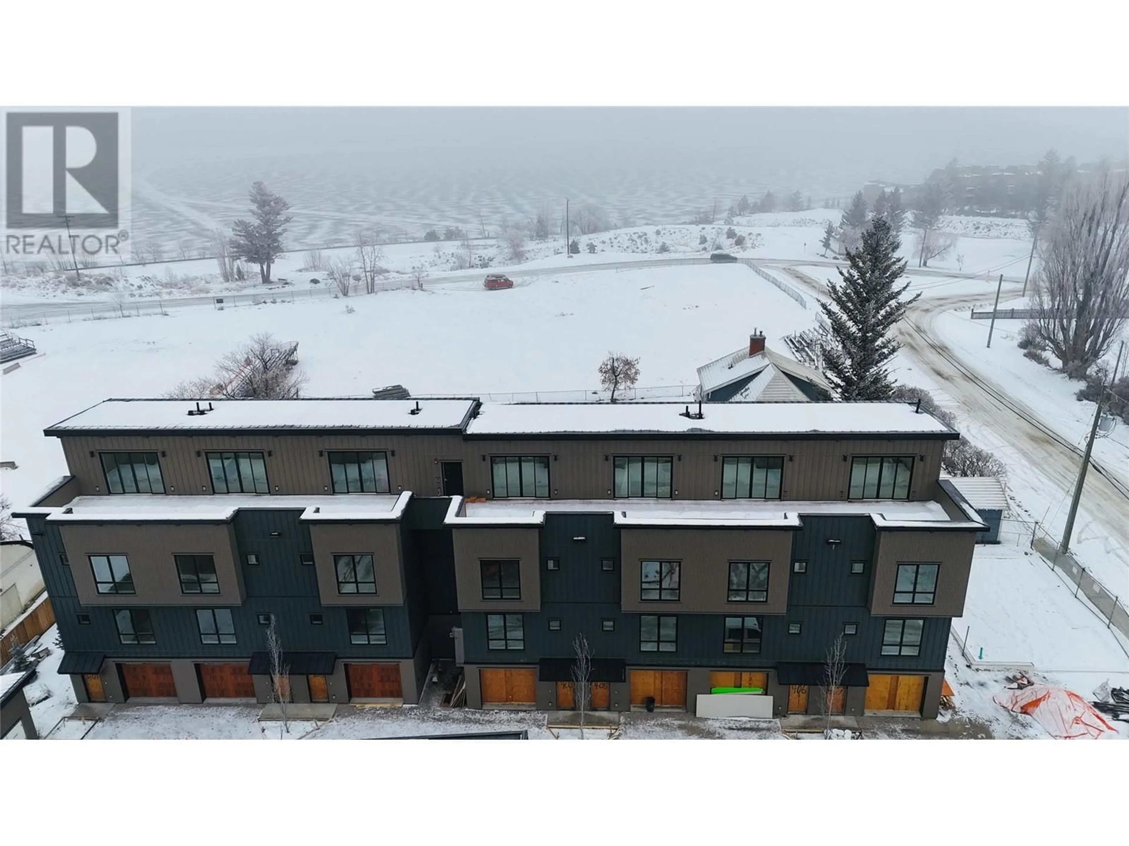 A pic from outside/outdoor area/front of a property/back of a property/a pic from drone, mountain view for 406 - 510 14TH STREET, Invermere British Columbia V0A1K0
