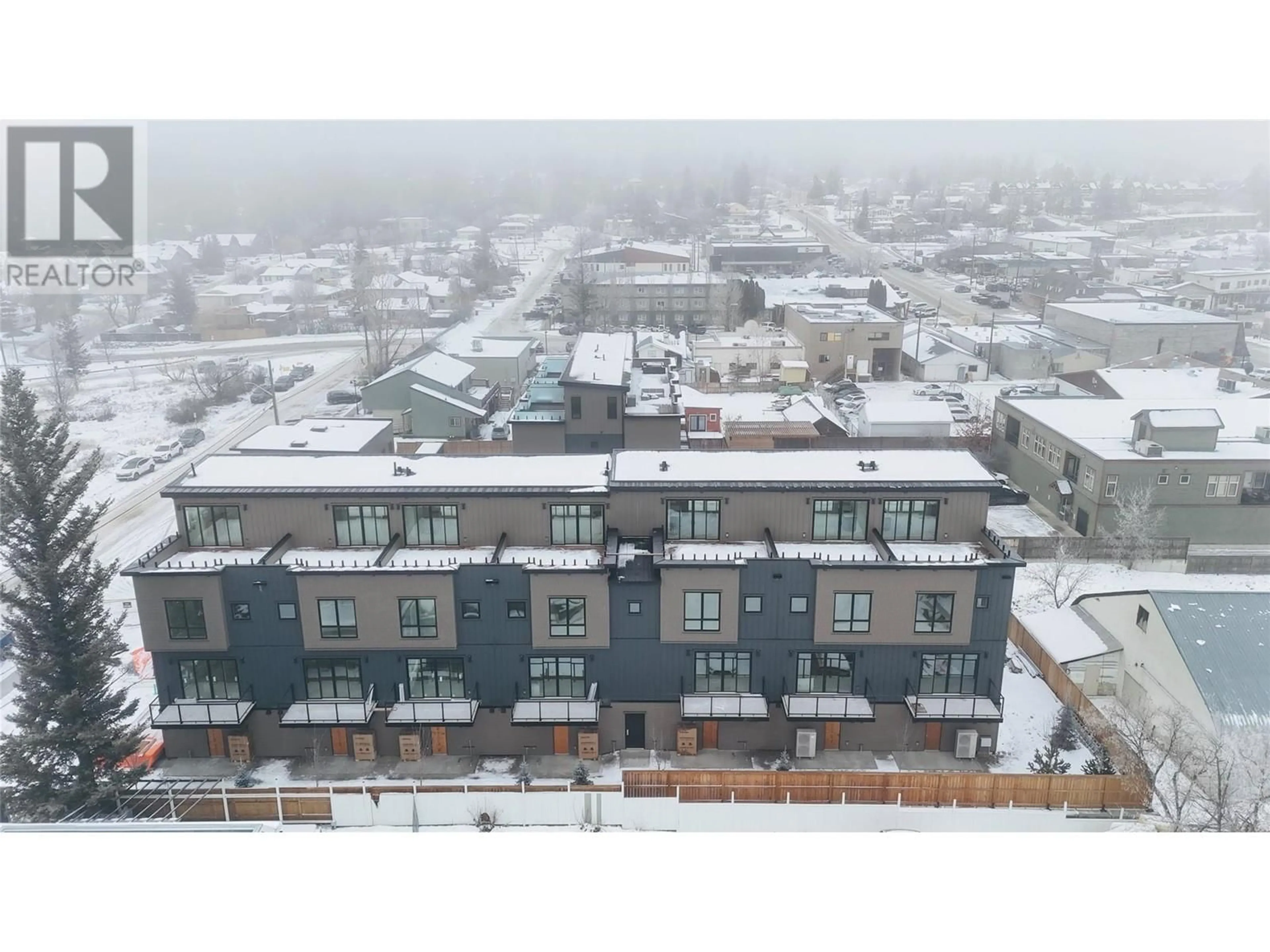 A pic from outside/outdoor area/front of a property/back of a property/a pic from drone, city buildings view from balcony for 406 - 510 14TH STREET, Invermere British Columbia V0A1K0