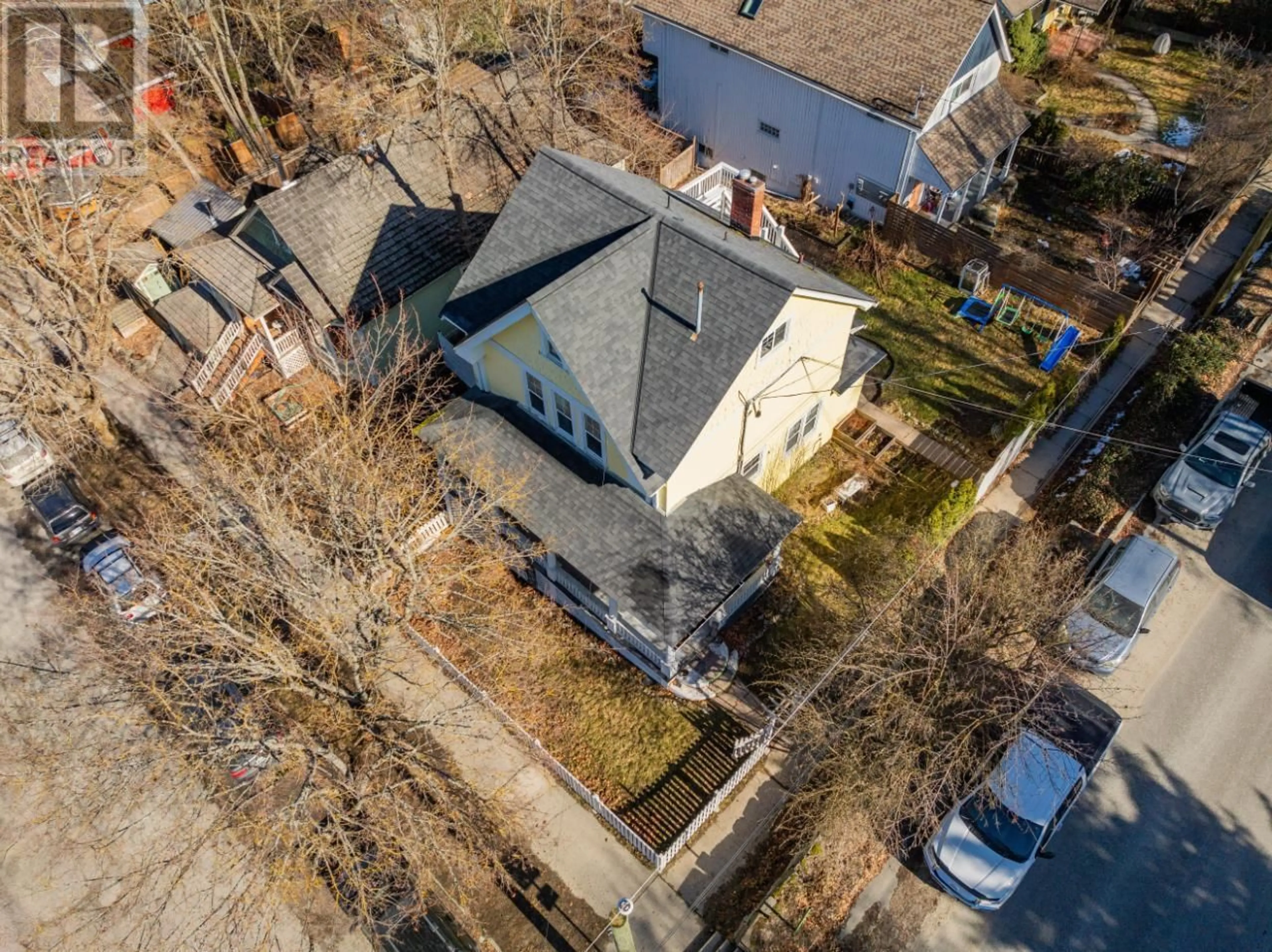 A pic from outside/outdoor area/front of a property/back of a property/a pic from drone, street for 723 HENDRYX Street, Nelson British Columbia V1L2B1