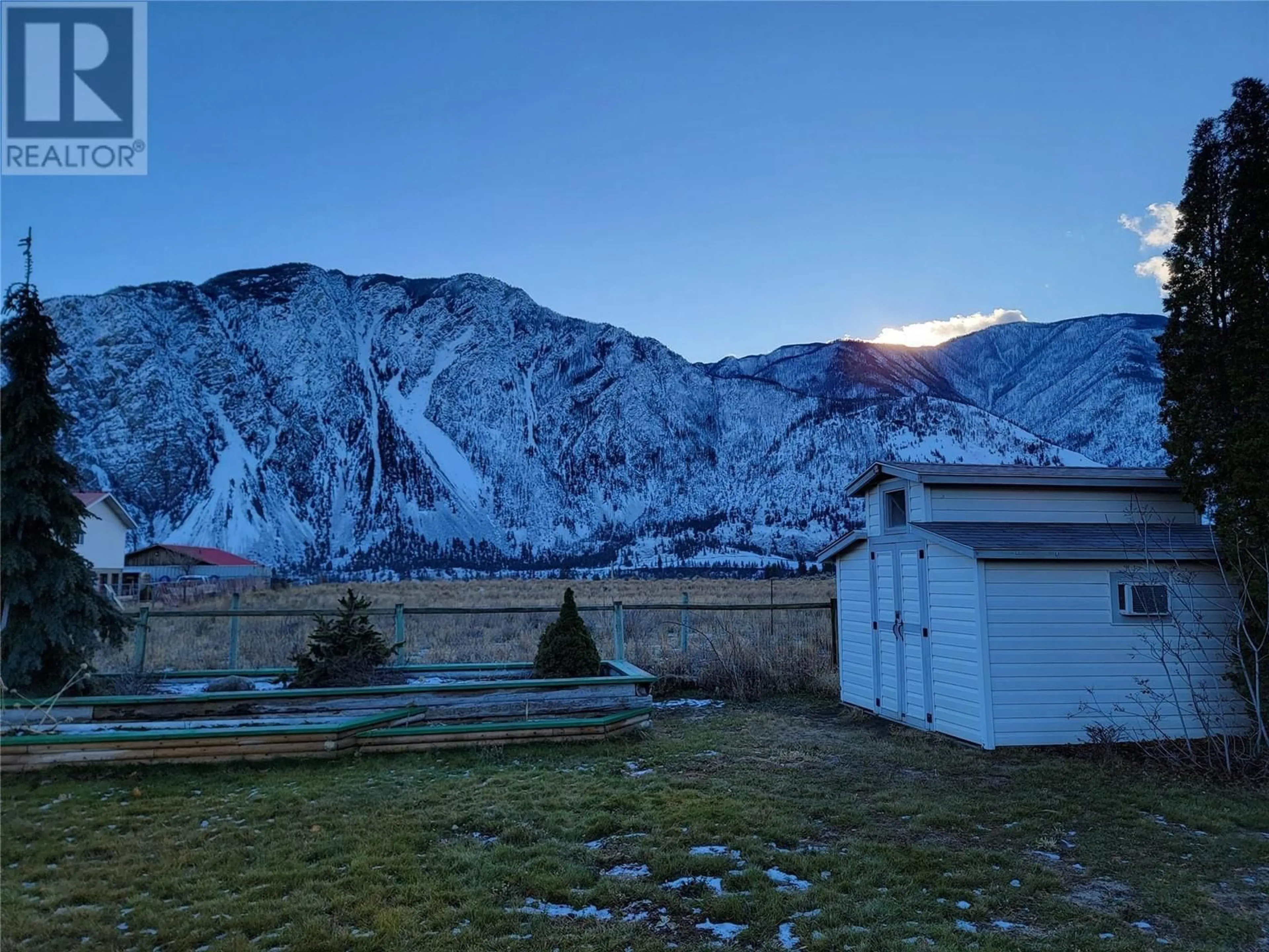 A pic from outside/outdoor area/front of a property/back of a property/a pic from drone, mountain view for 829 3rd Avenue, Keremeos British Columbia V0X1N2