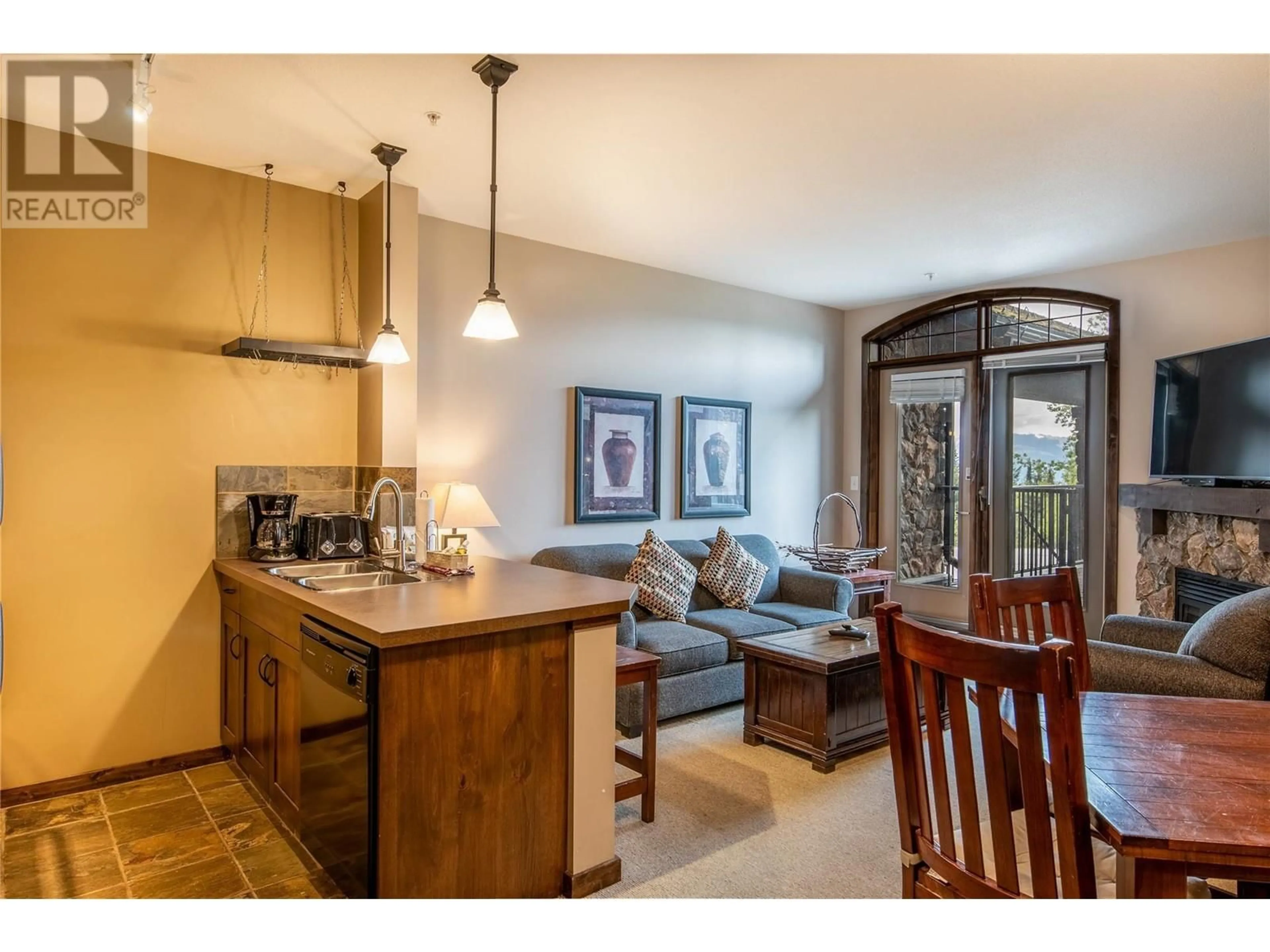 Open concept kitchen, unknown for 1545 KICKING HORSE Trail Unit# 107, Golden British Columbia V0A1H0