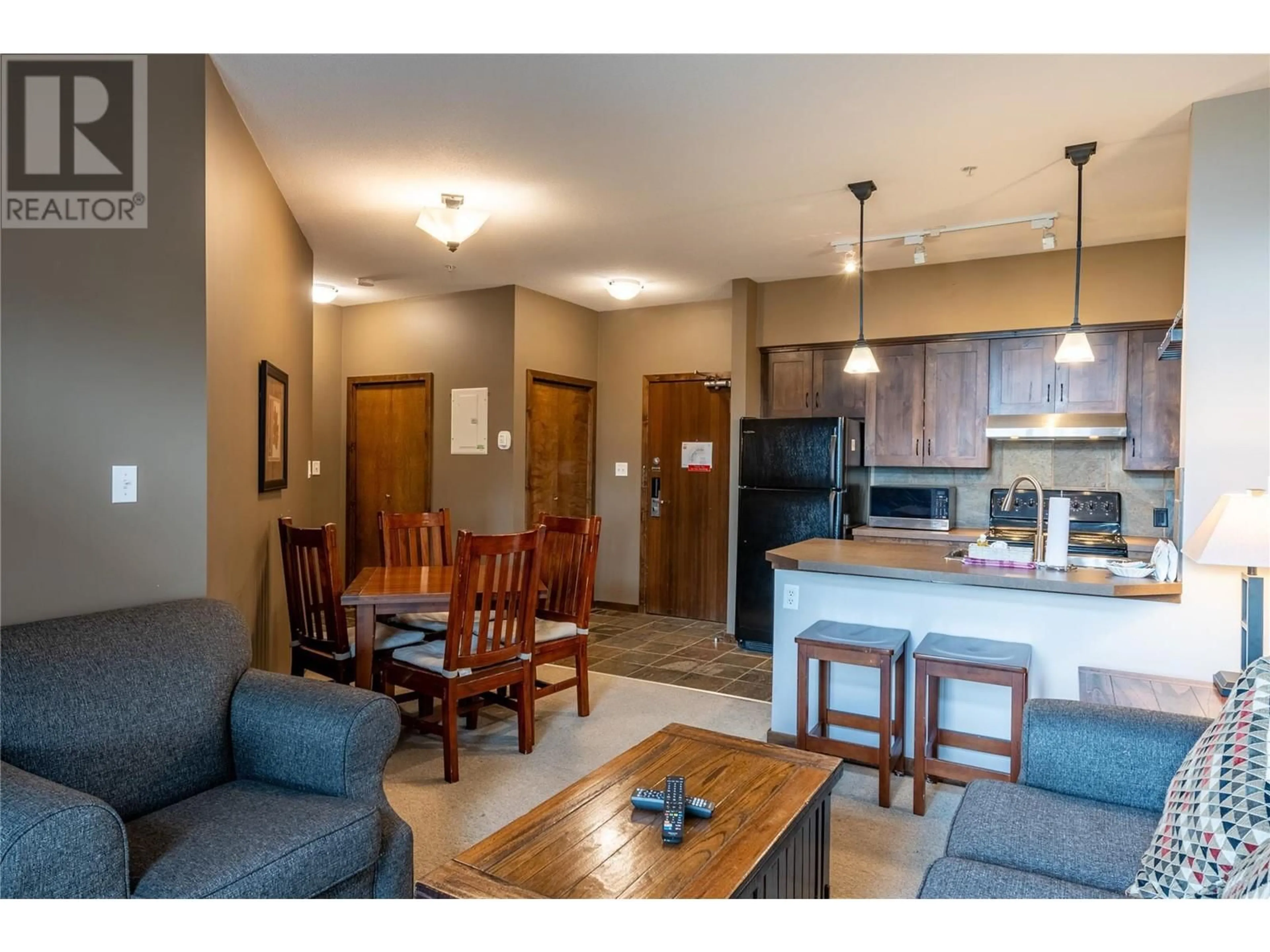 Open concept kitchen, unknown for 1545 KICKING HORSE Trail Unit# 107, Golden British Columbia V0A1H0