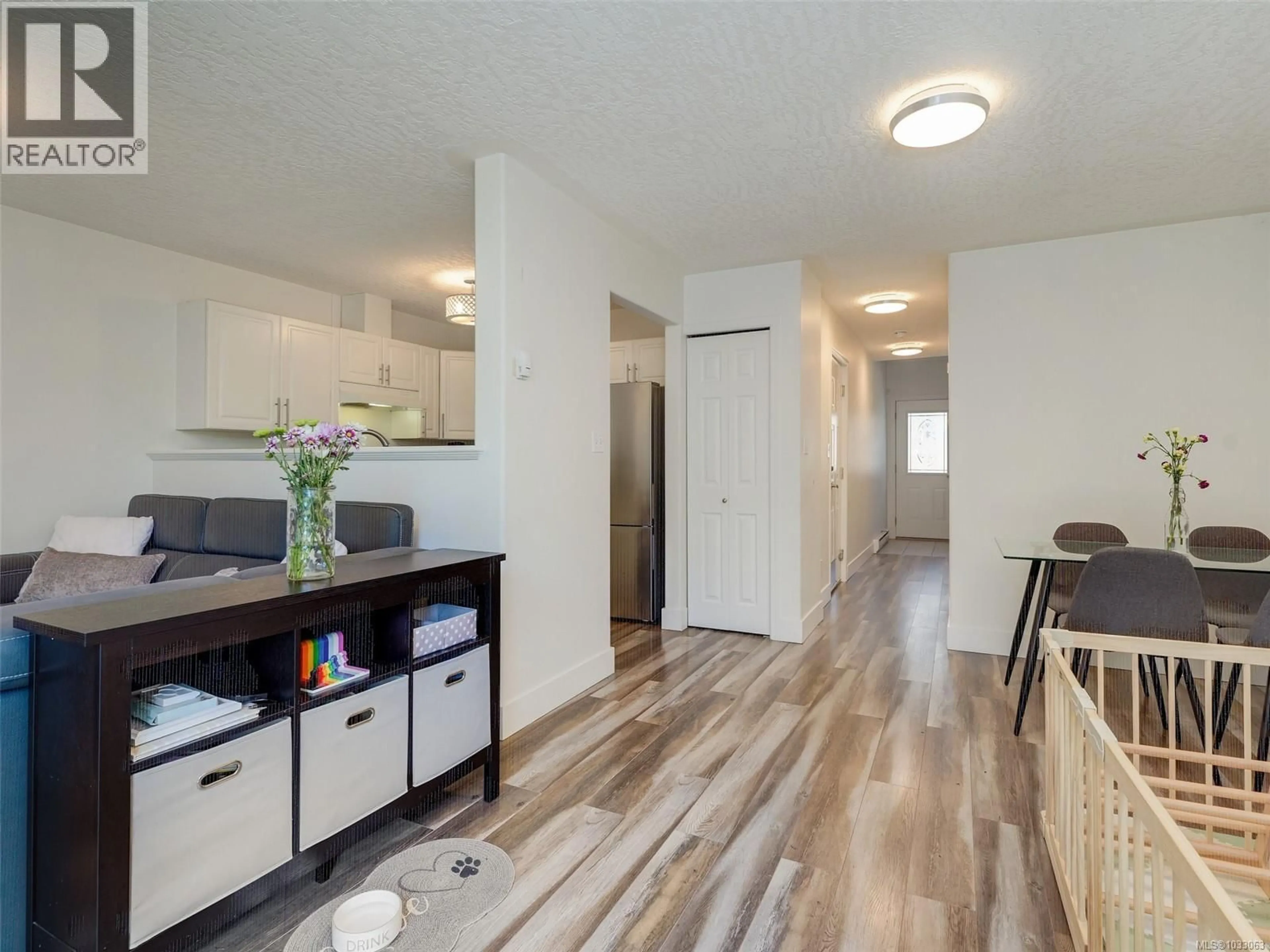 Open concept kitchen, wood/laminate floor for 108 - 920 DUNFORD AVENUE, Langford British Columbia V9B2S3