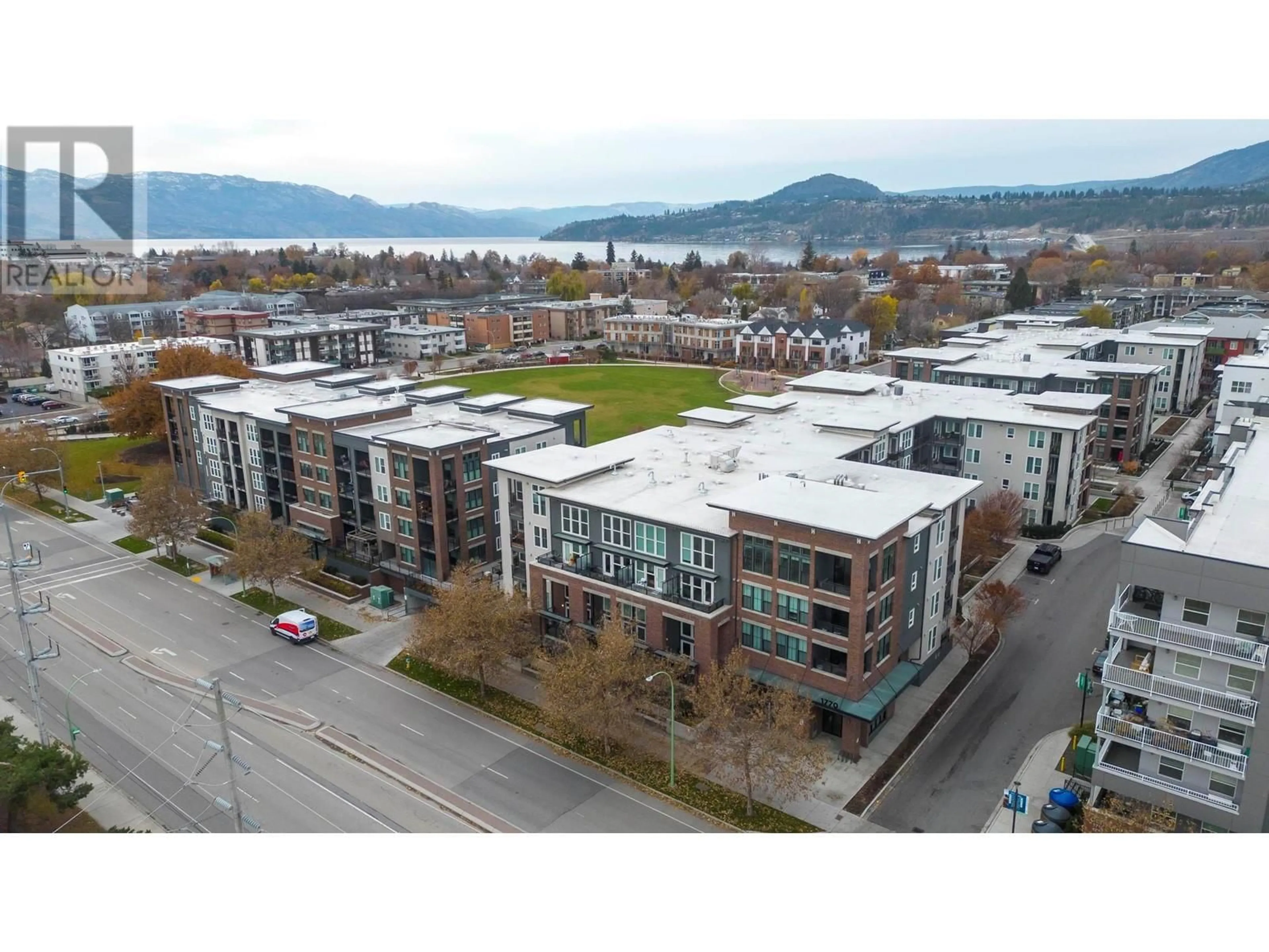 A pic from outside/outdoor area/front of a property/back of a property/a pic from drone, unknown for 1770 Richter Street Unit# 206, Kelowna British Columbia V1Y0E6