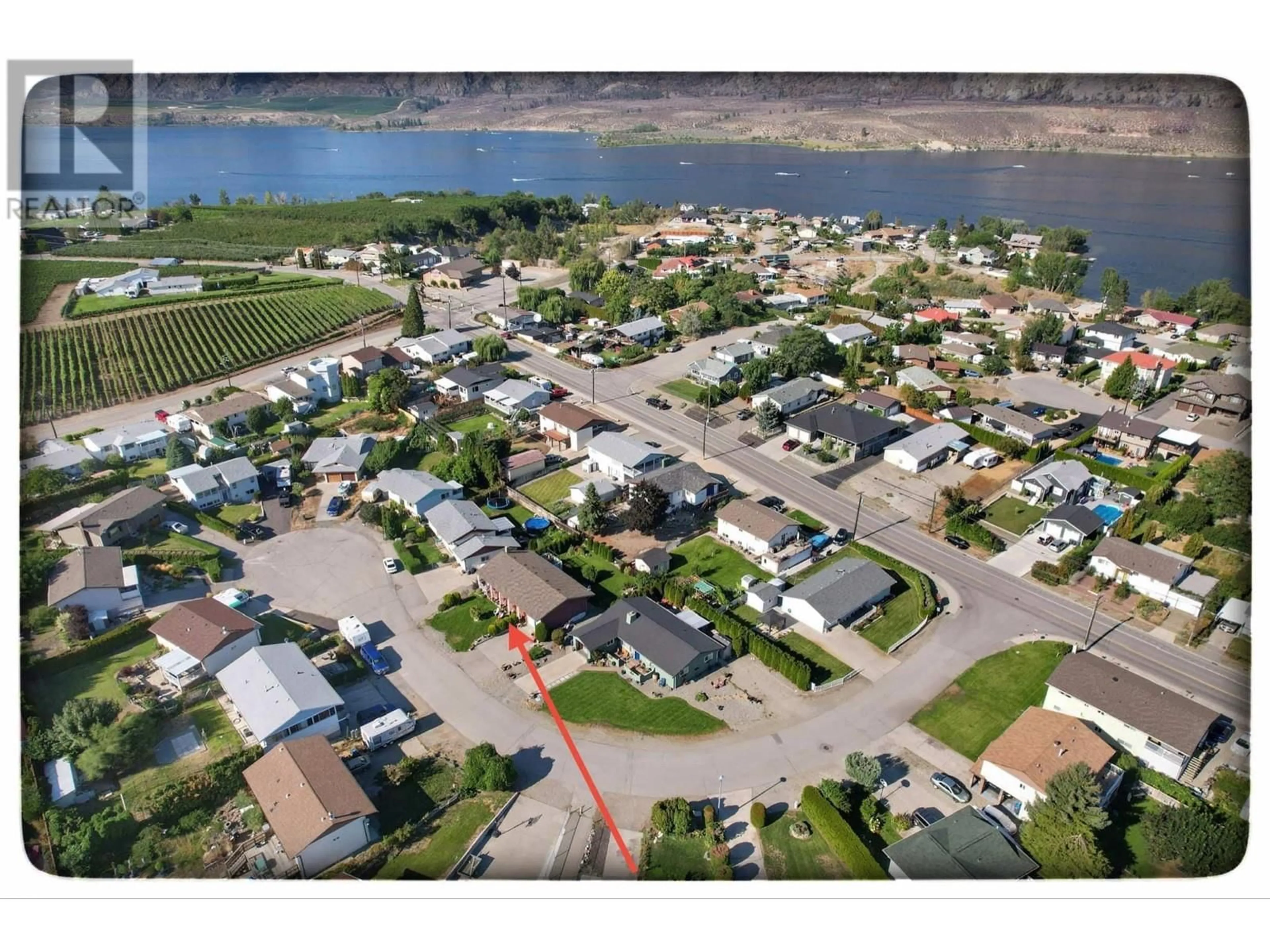 A pic from outside/outdoor area/front of a property/back of a property/a pic from drone, water/lake/river/ocean view for 15 Santa Rosa Place, Osoyoos British Columbia V0H1V2