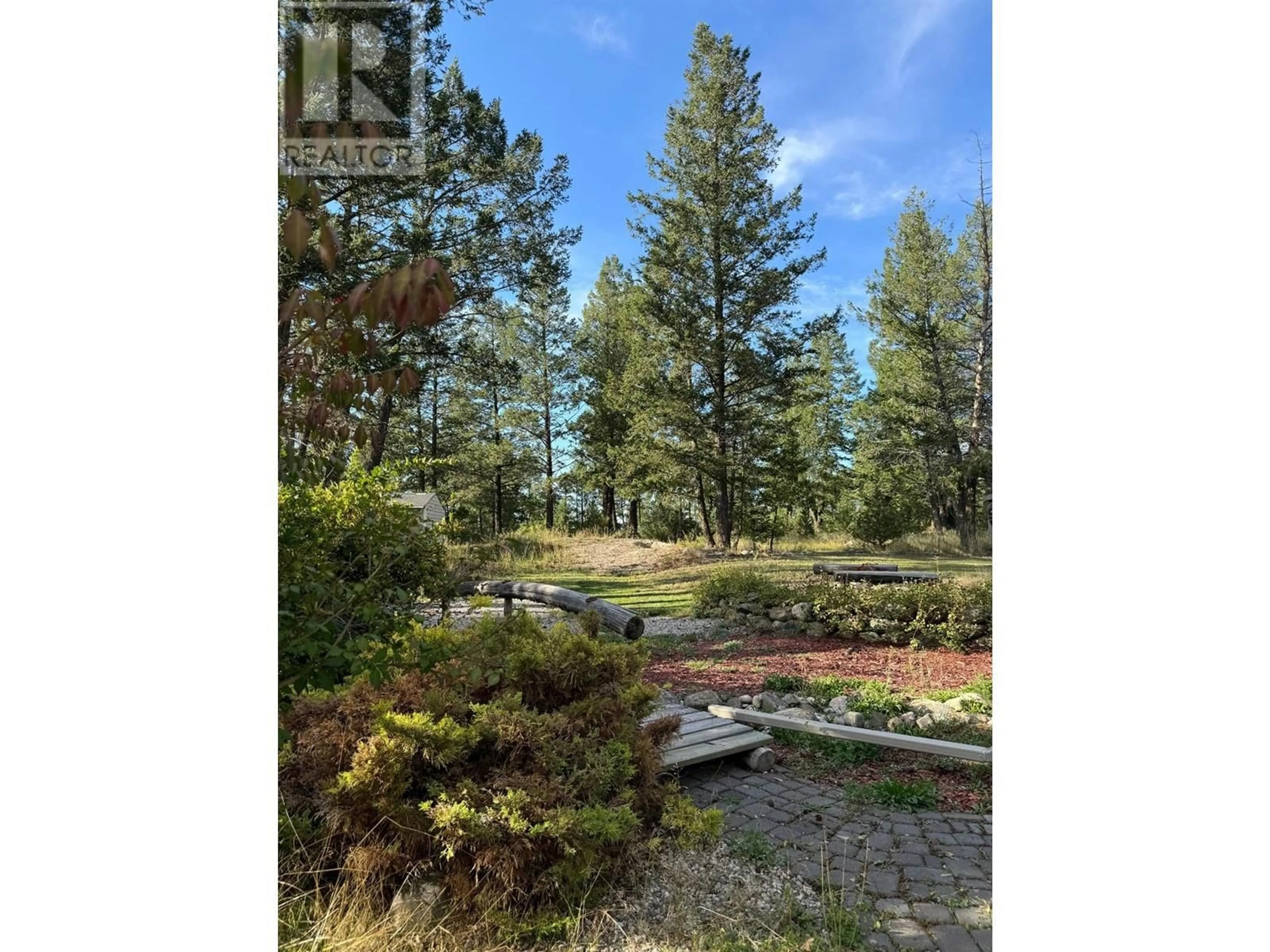A pic from outside/outdoor area/front of a property/back of a property/a pic from drone, forest/trees view for 10A WOLF CRESCENT, Invermere British Columbia V0A1K2