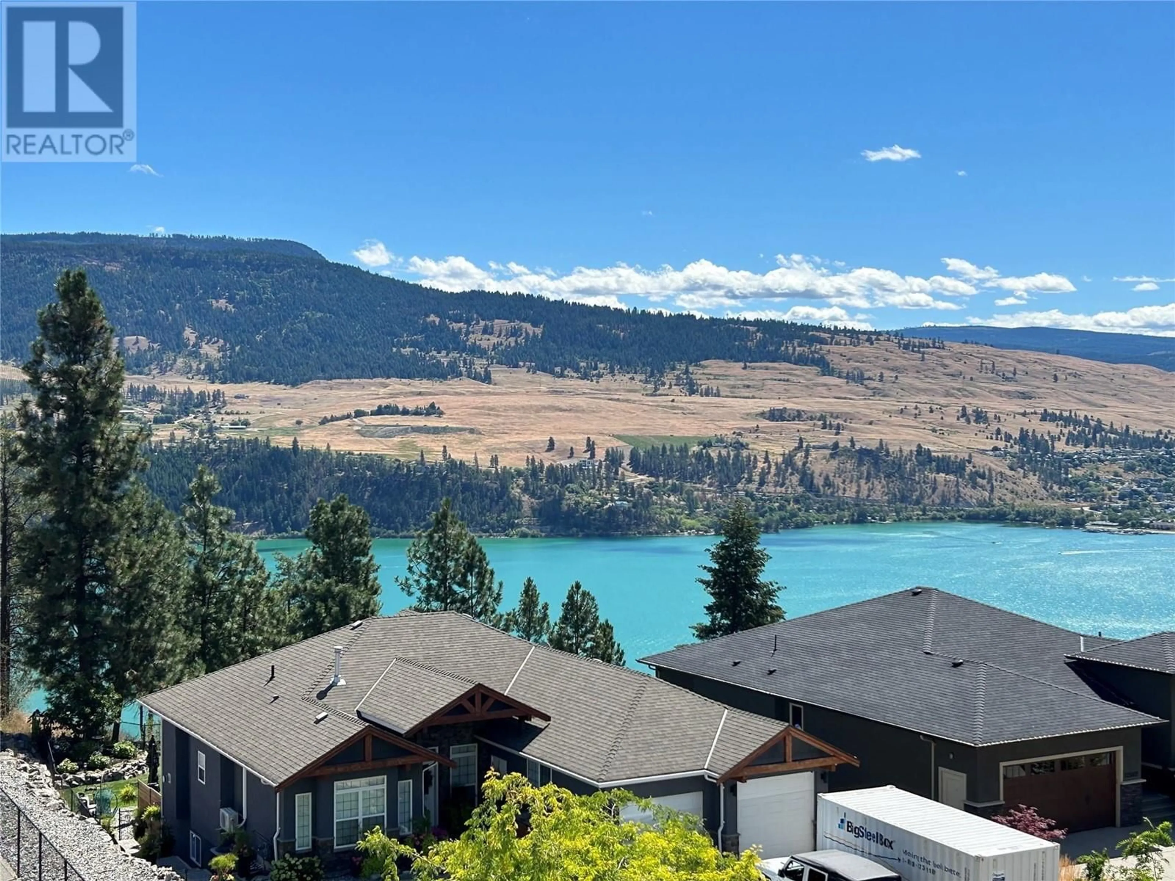 A pic from outside/outdoor area/front of a property/back of a property/a pic from drone, water/lake/river/ocean view for 12686 Cliffshore Drive, Lake Country British Columbia V4V2P6