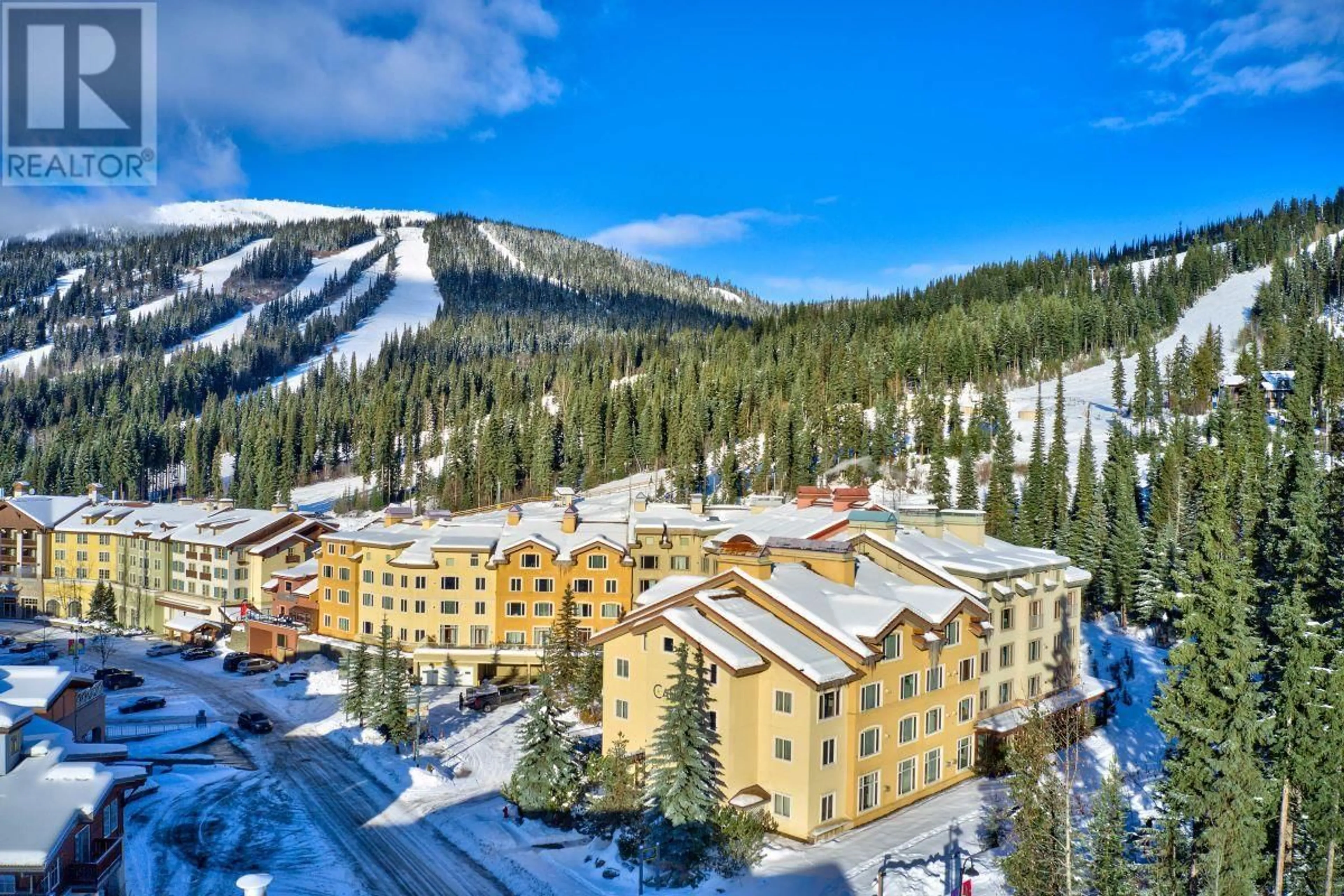 A pic from outside/outdoor area/front of a property/back of a property/a pic from drone, mountain view for 3220 Village Way Unit# 205/211, Sun Peaks British Columbia V0E5N0