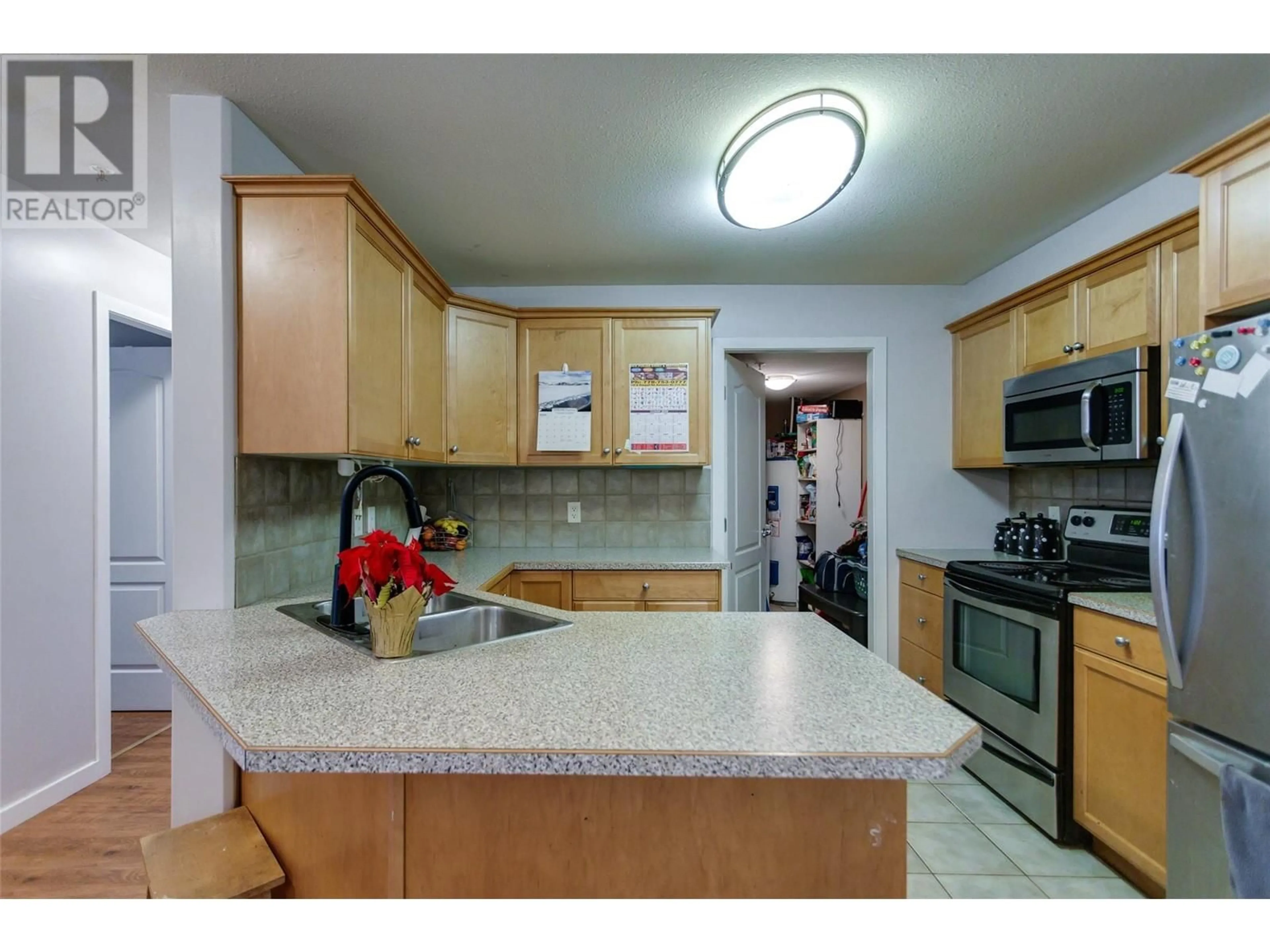 Standard kitchen, ceramic/tile floor for 260 Franklyn Road Unit# 113, Kelowna British Columbia V1K1K1