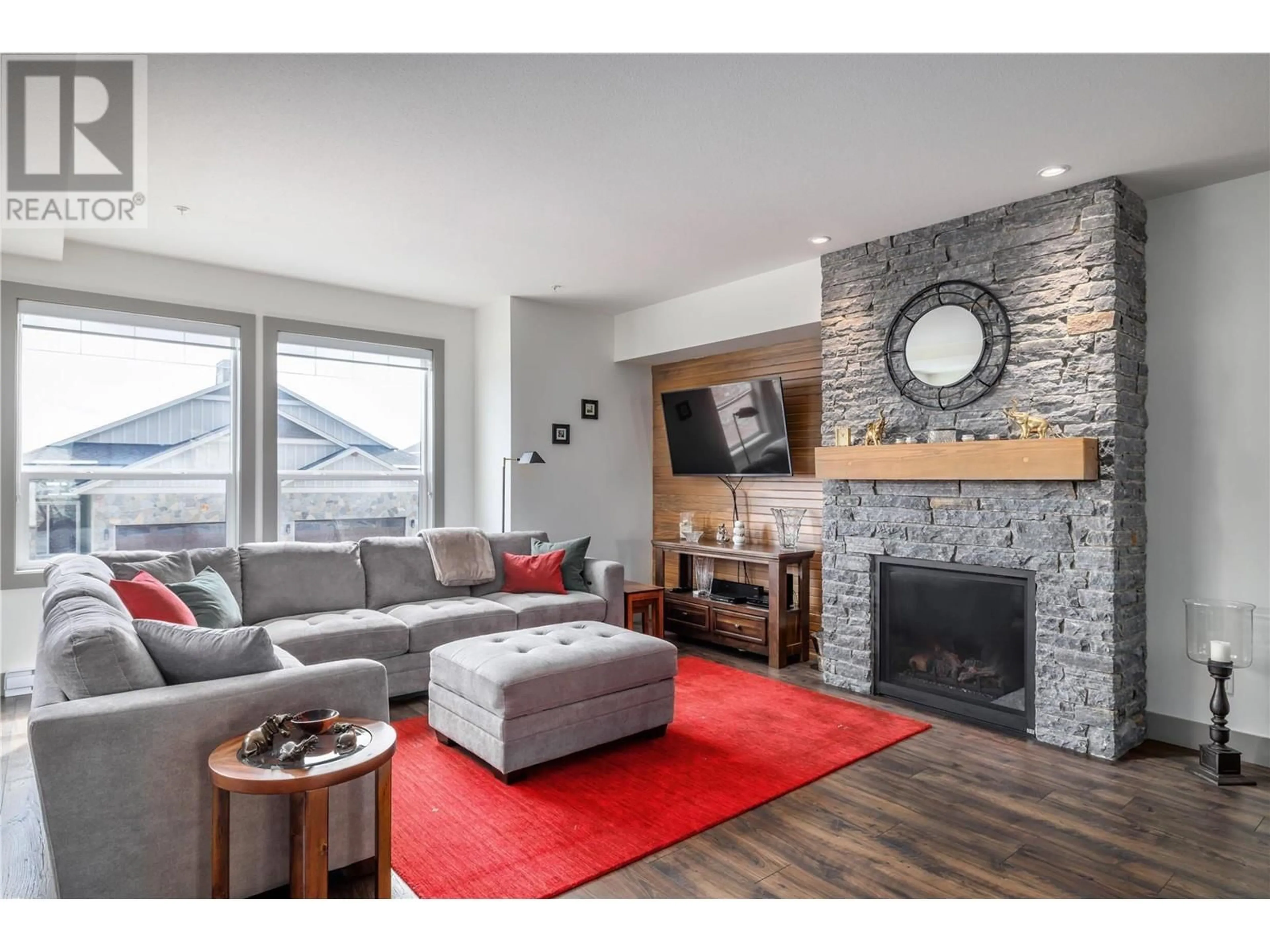 Living room with furniture, unknown for 240A Grizzly Ridge Trail, Big White British Columbia V1P1P3