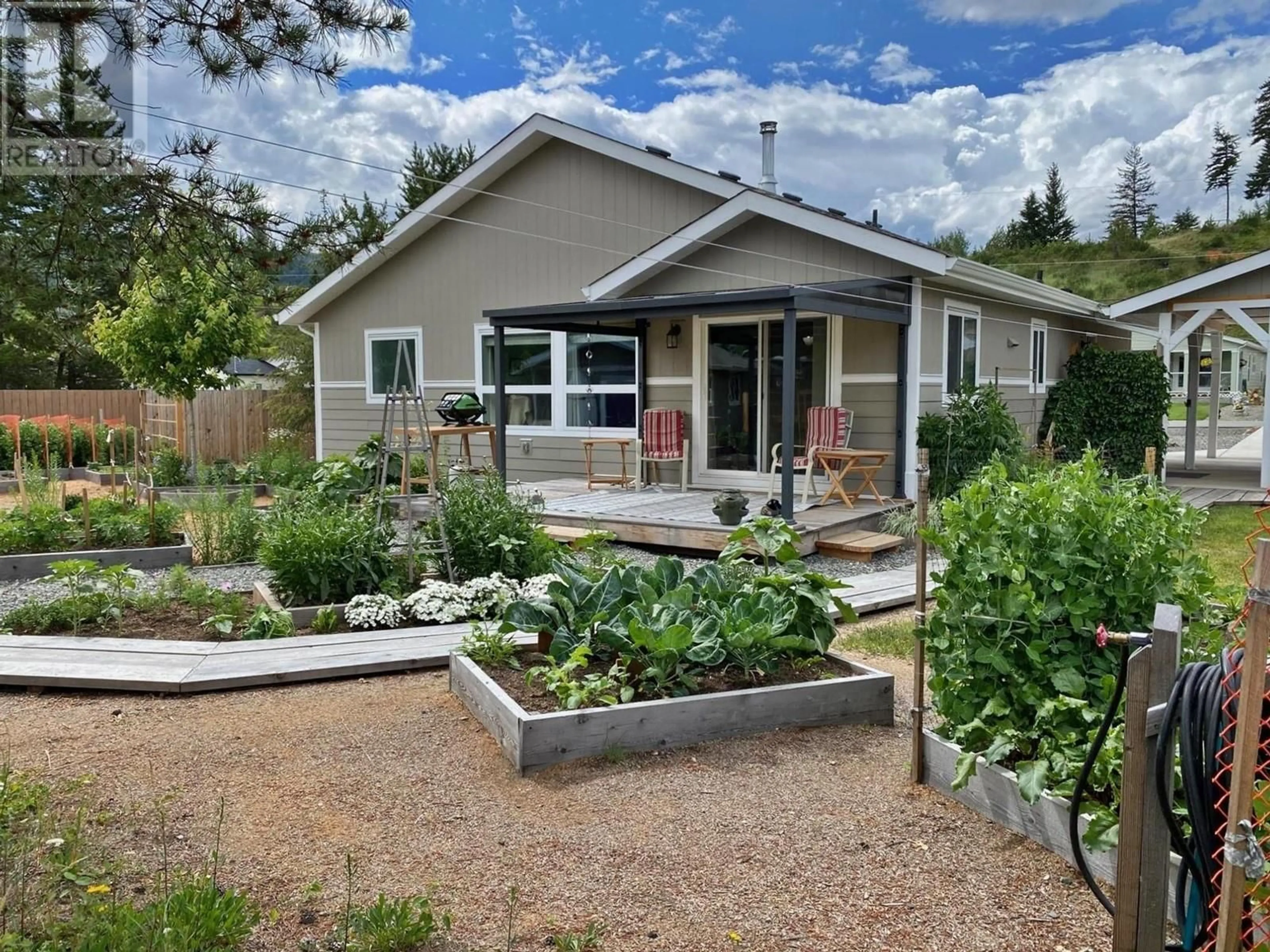 Home with vinyl exterior material, street for 458 Siska Drive, Barriere British Columbia V0E1E0