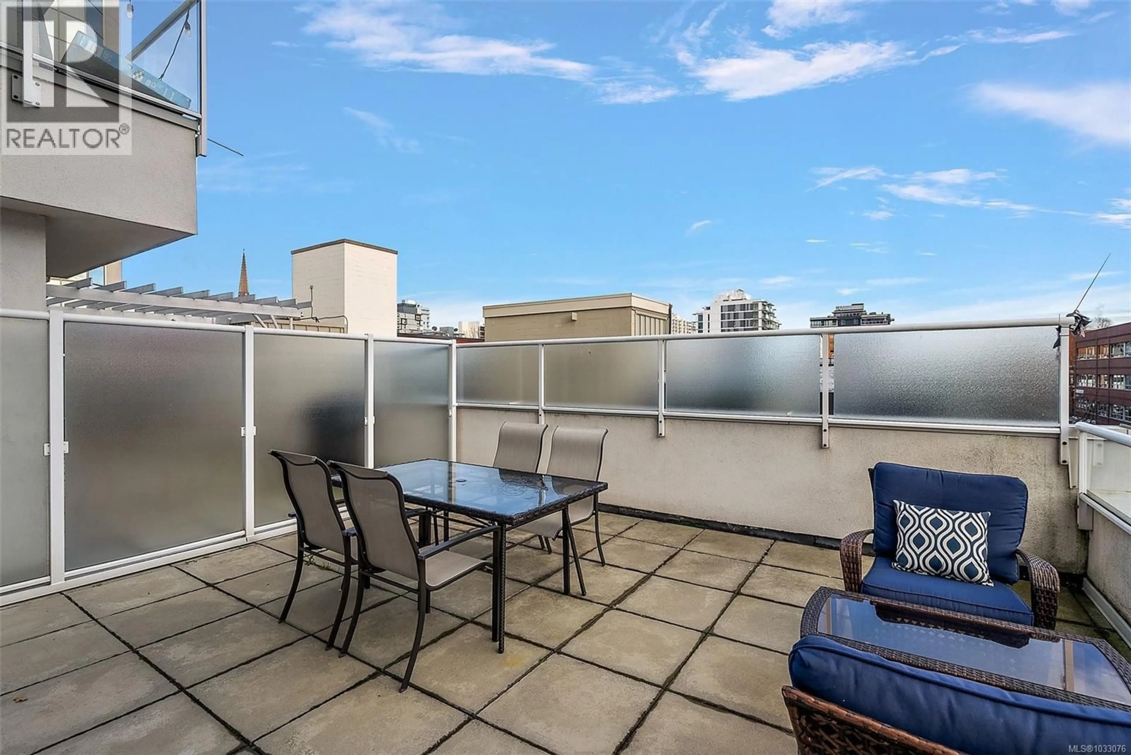 Patio, city buildings view from balcony for 404 - 732 BROUGHTON STREET, Victoria British Columbia V8W3E9