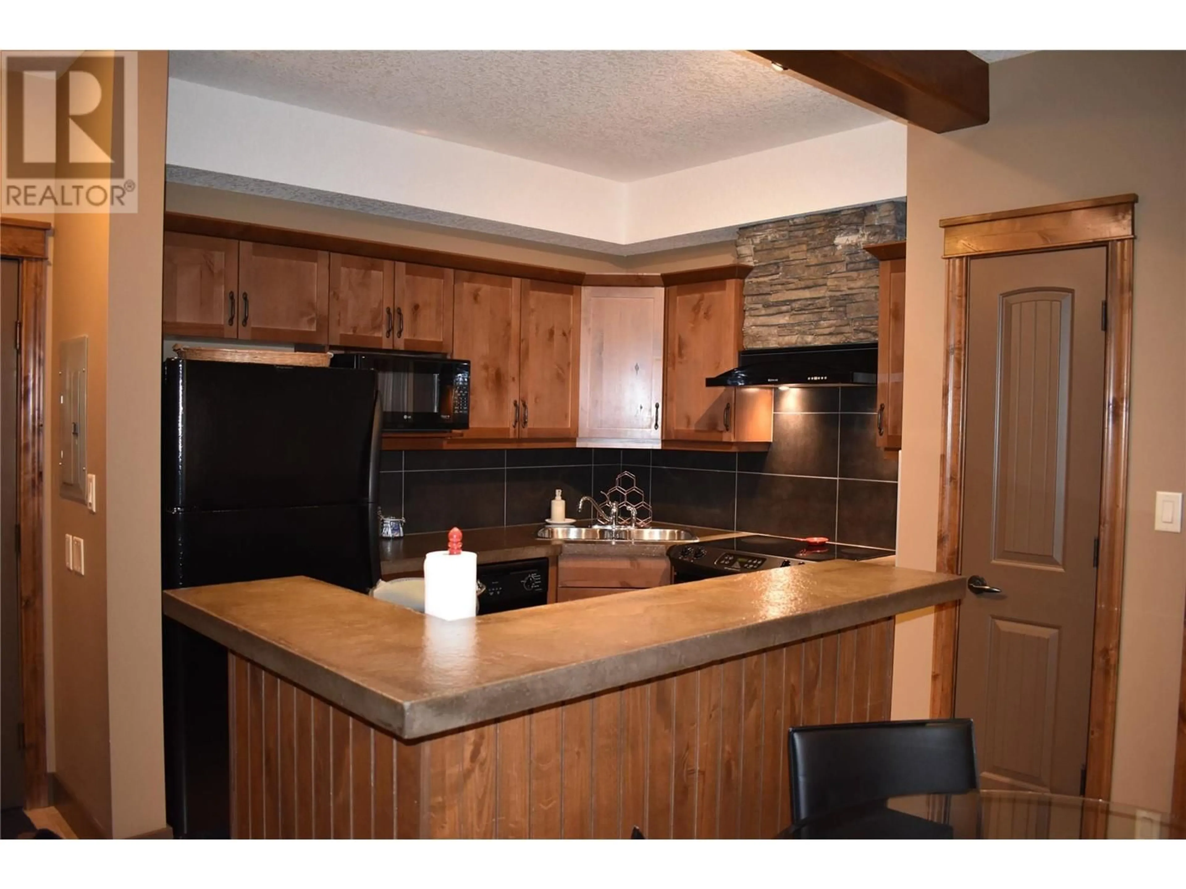 Standard kitchen, wood/laminate floor for 7495 COLUMBIA Avenue Unit# 1204 Lot# SL , Radium Hot Springs British Columbia V0A1M0