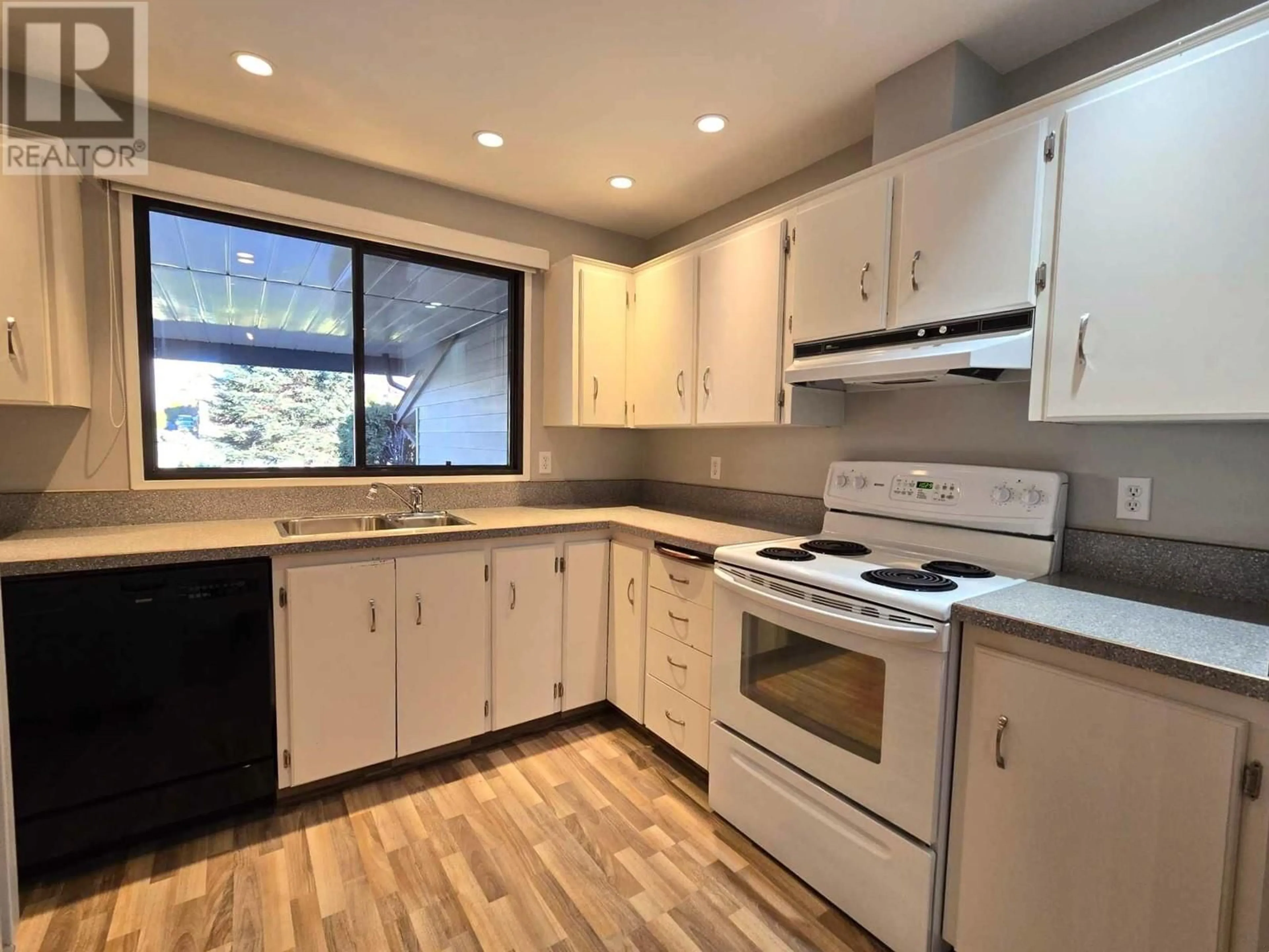 Standard kitchen, unknown for 7717 Prairie Valley Road Unit# 103, Summerland British Columbia V0H1Z4