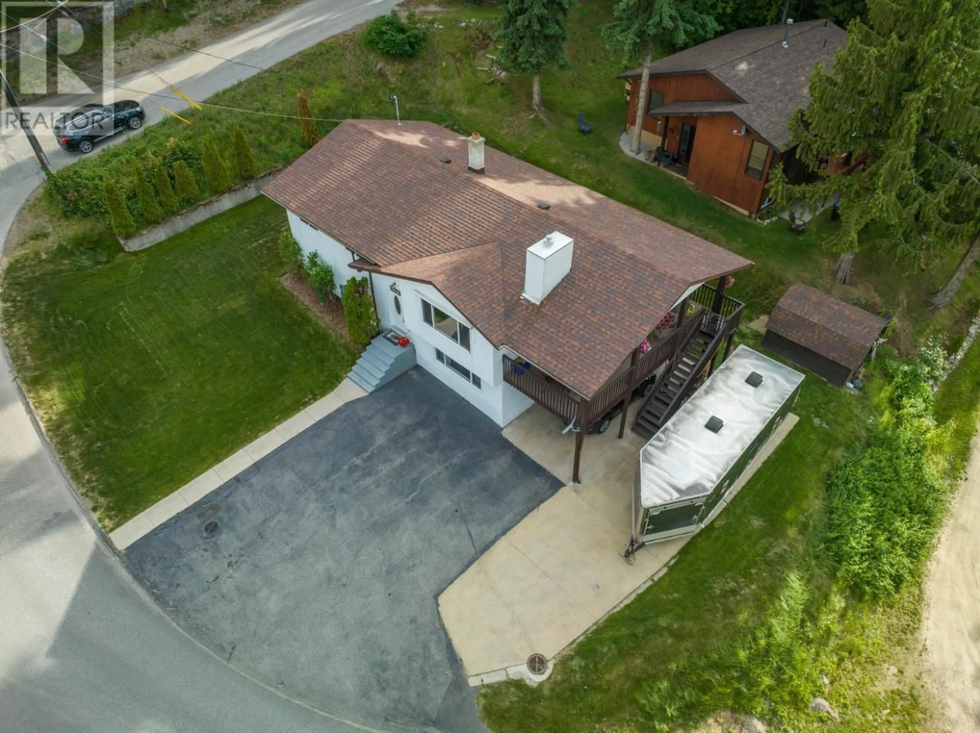 A pic from outside/outdoor area/front of a property/back of a property/a pic from drone, street for 1415 EARL Street, Rossland British Columbia V0G1Y0