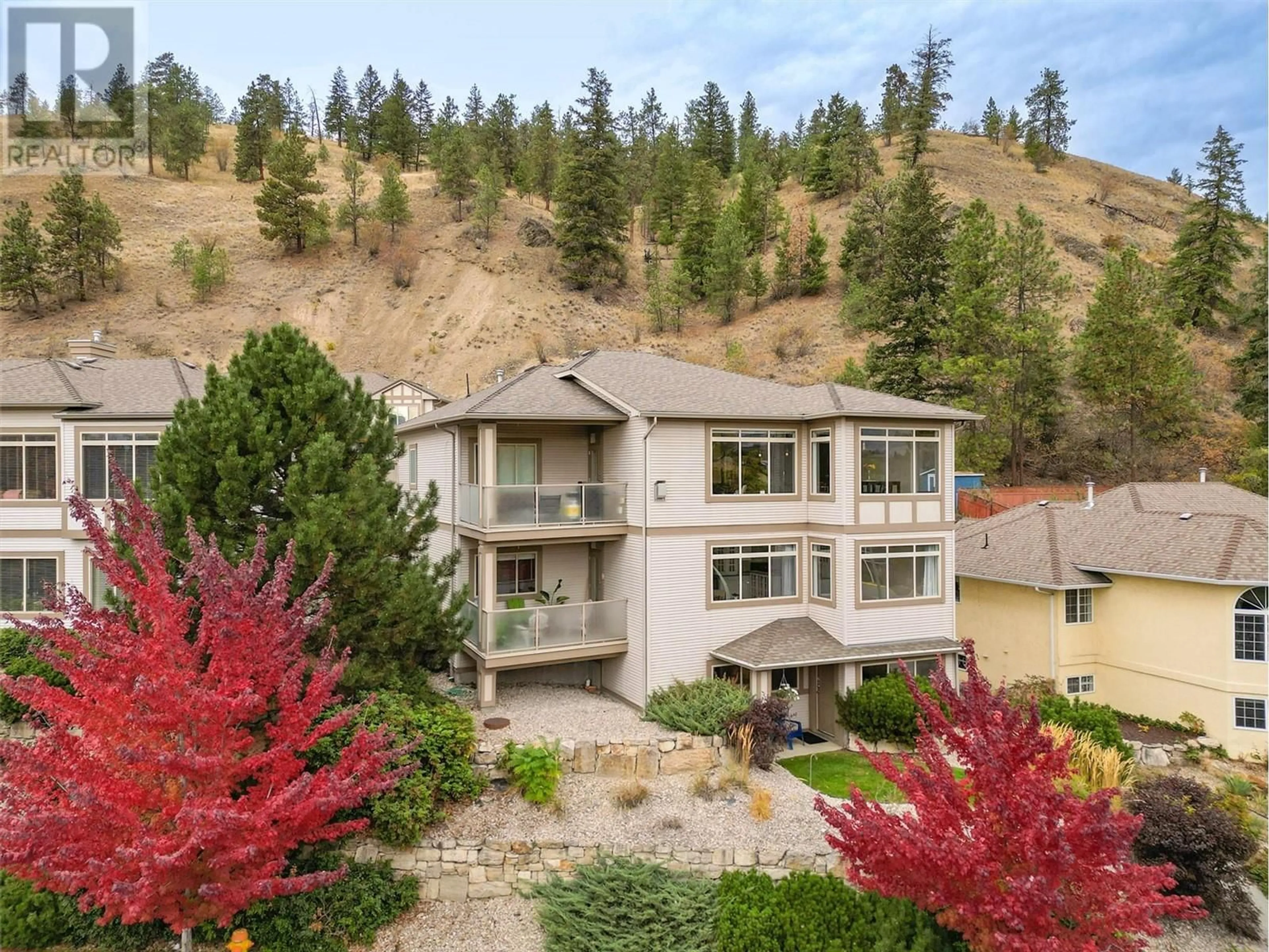 A pic from outside/outdoor area/front of a property/back of a property/a pic from drone, mountain view for 115 - 550 GLENMEADOWS ROAD, Kelowna British Columbia V1V1X3
