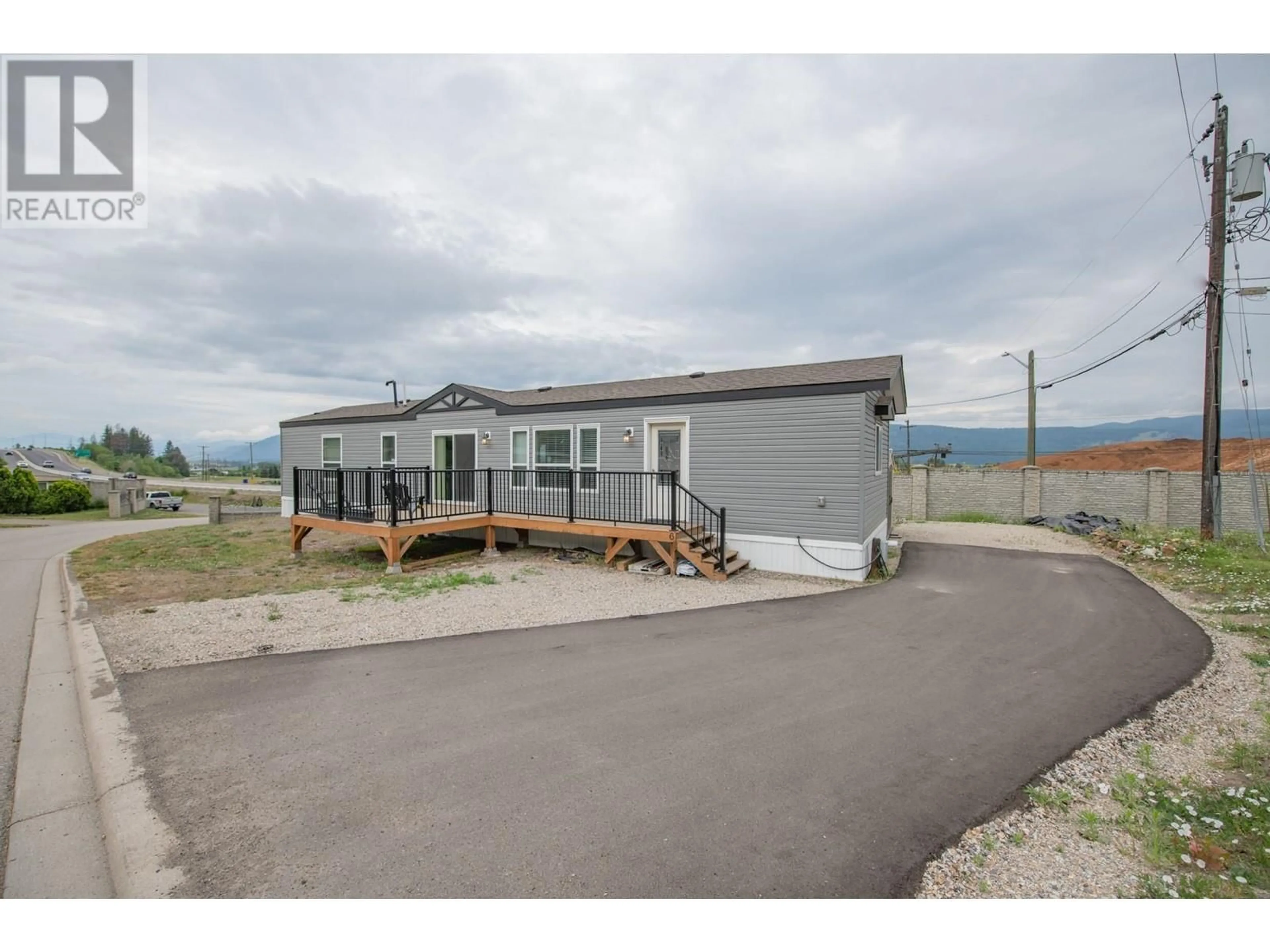 A pic from outside/outdoor area/front of a property/back of a property/a pic from drone, mountain view for 844 Hutley Road Lot# 6, Armstrong British Columbia V0W1B7