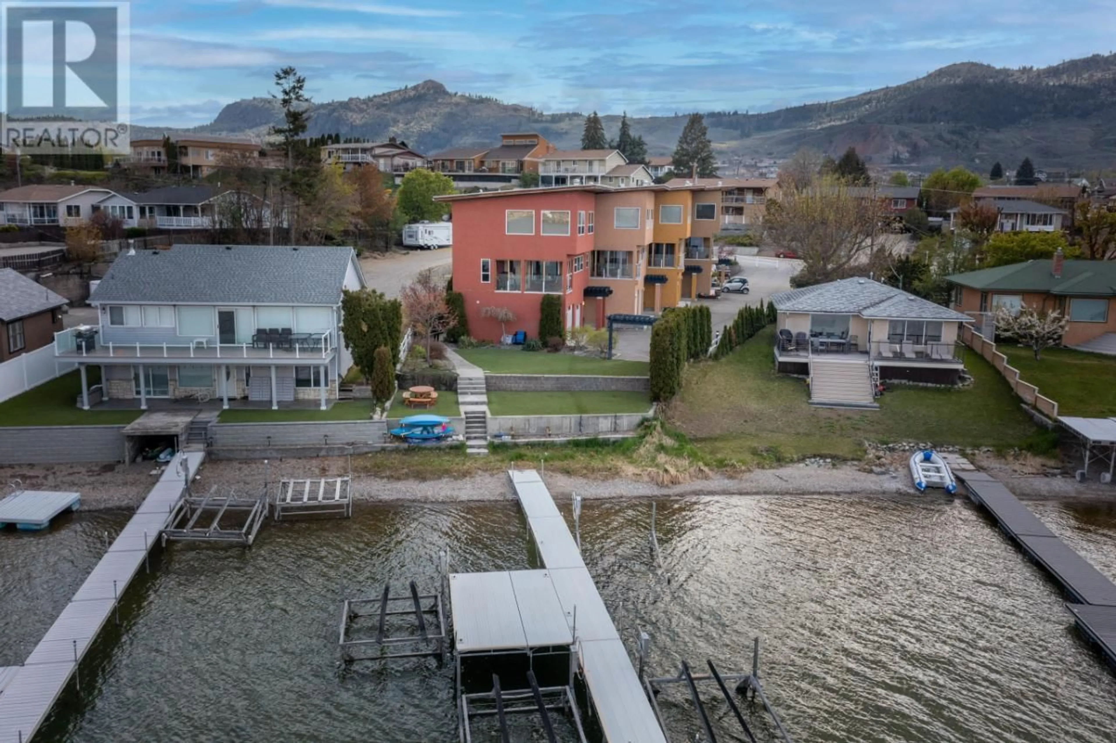 A pic from outside/outdoor area/front of a property/back of a property/a pic from drone, water/lake/river/ocean view for 5405 OLEANDER Drive Unit# 1, Osoyoos British Columbia V0H1V0