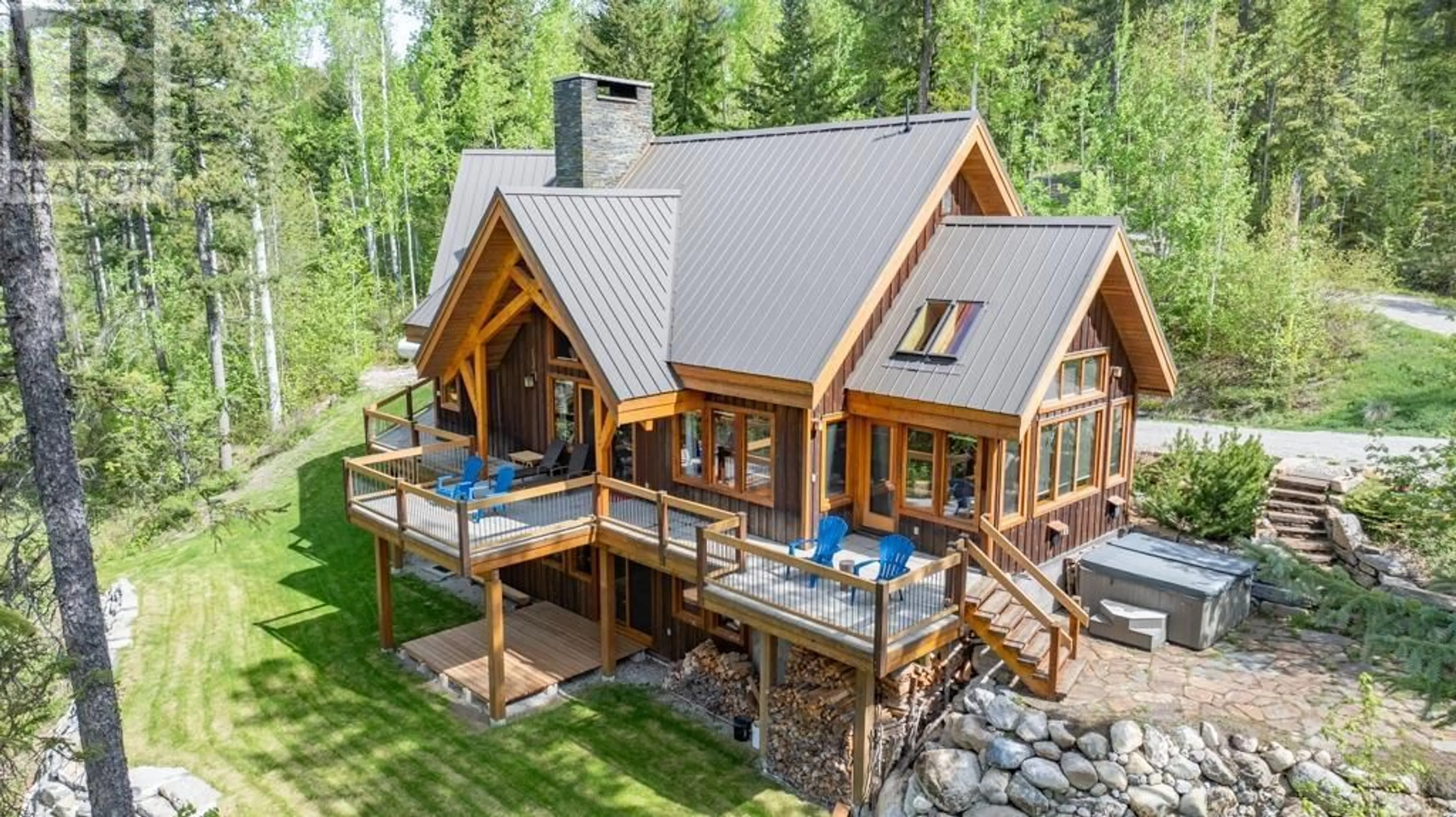 A pic from outside/outdoor area/front of a property/back of a property/a pic from drone, unknown for 1438 BLACK BEAR Drive, Golden British Columbia V0A1H7