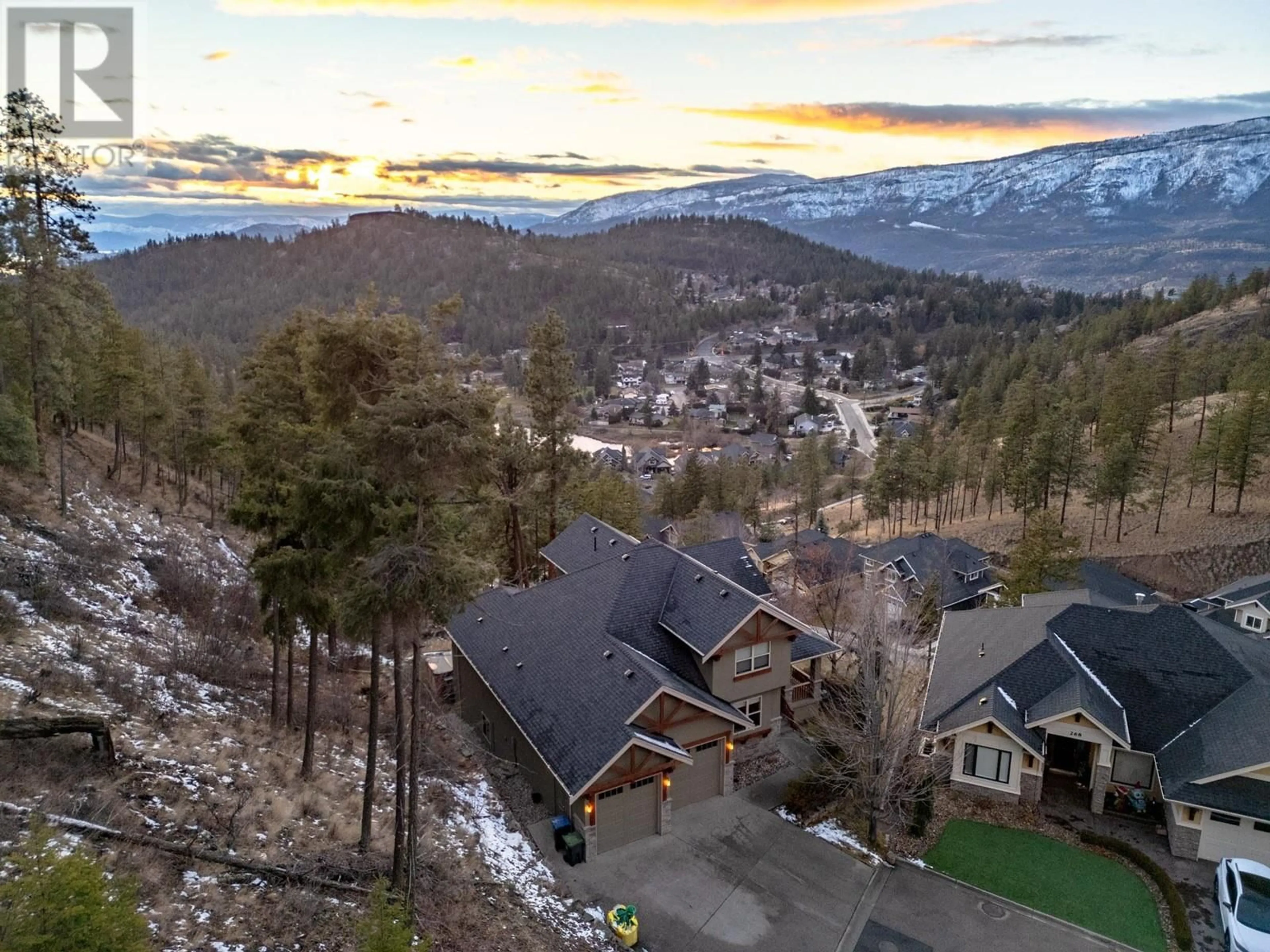 A pic from outside/outdoor area/front of a property/back of a property/a pic from drone, mountain view for 272 Triple Tree Place, Kelowna British Columbia V1V2Z8