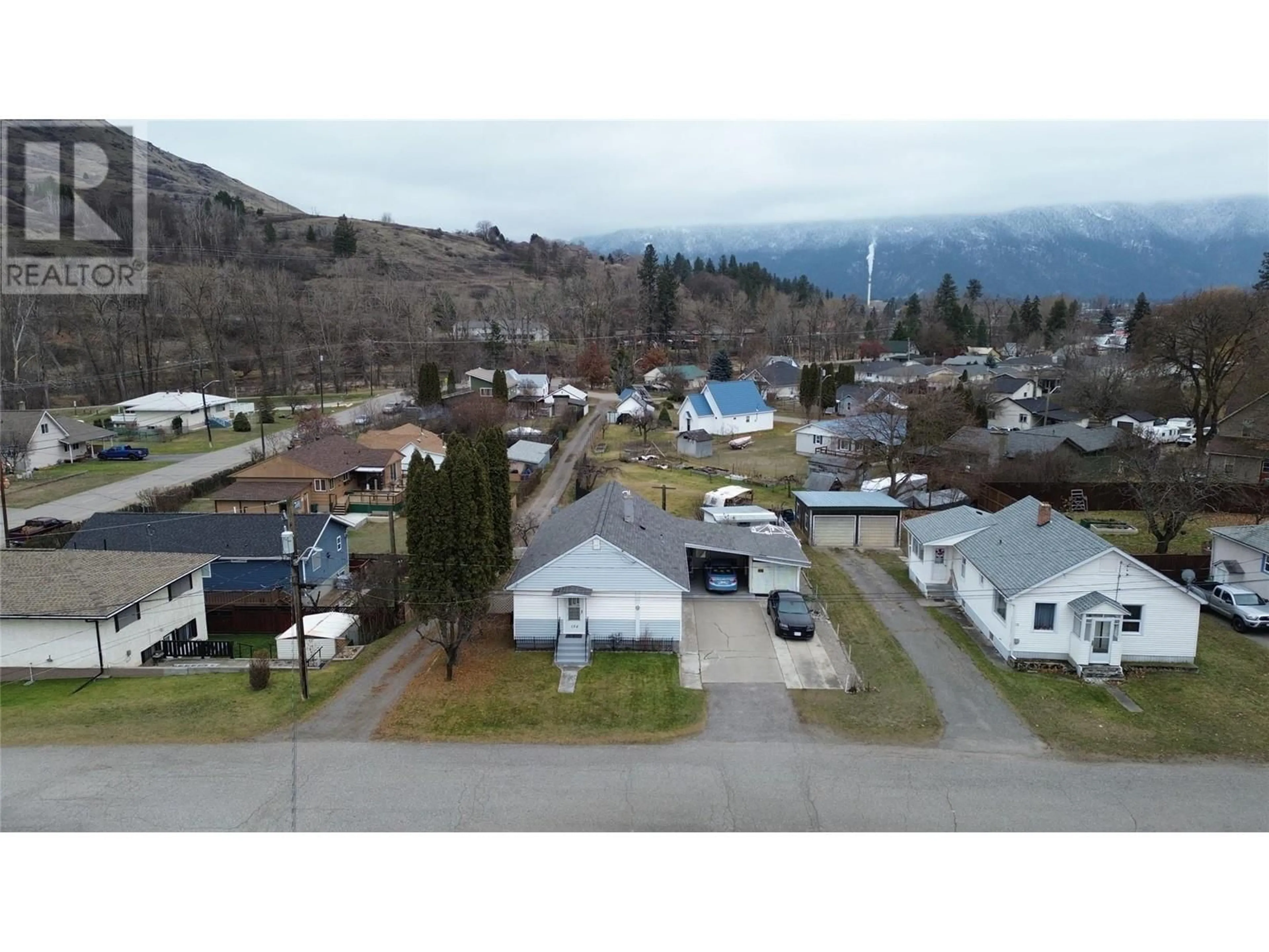 A pic from outside/outdoor area/front of a property/back of a property/a pic from drone, mountain view for 154 80TH Avenue, Grand Forks British Columbia V0H1H0