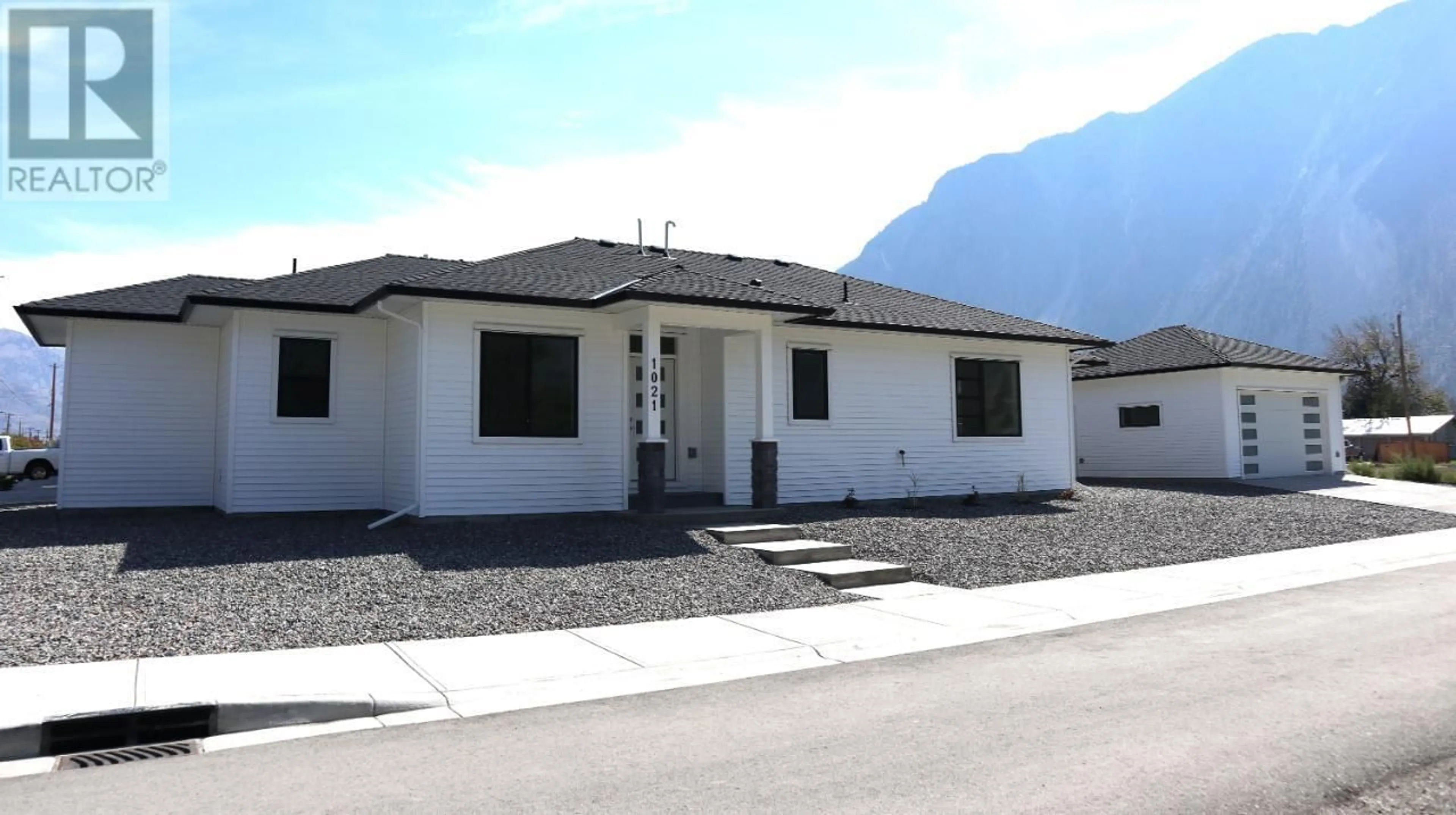 Home with vinyl exterior material, mountain view for 1021 3RD Street, Keremeos British Columbia V0X1N3