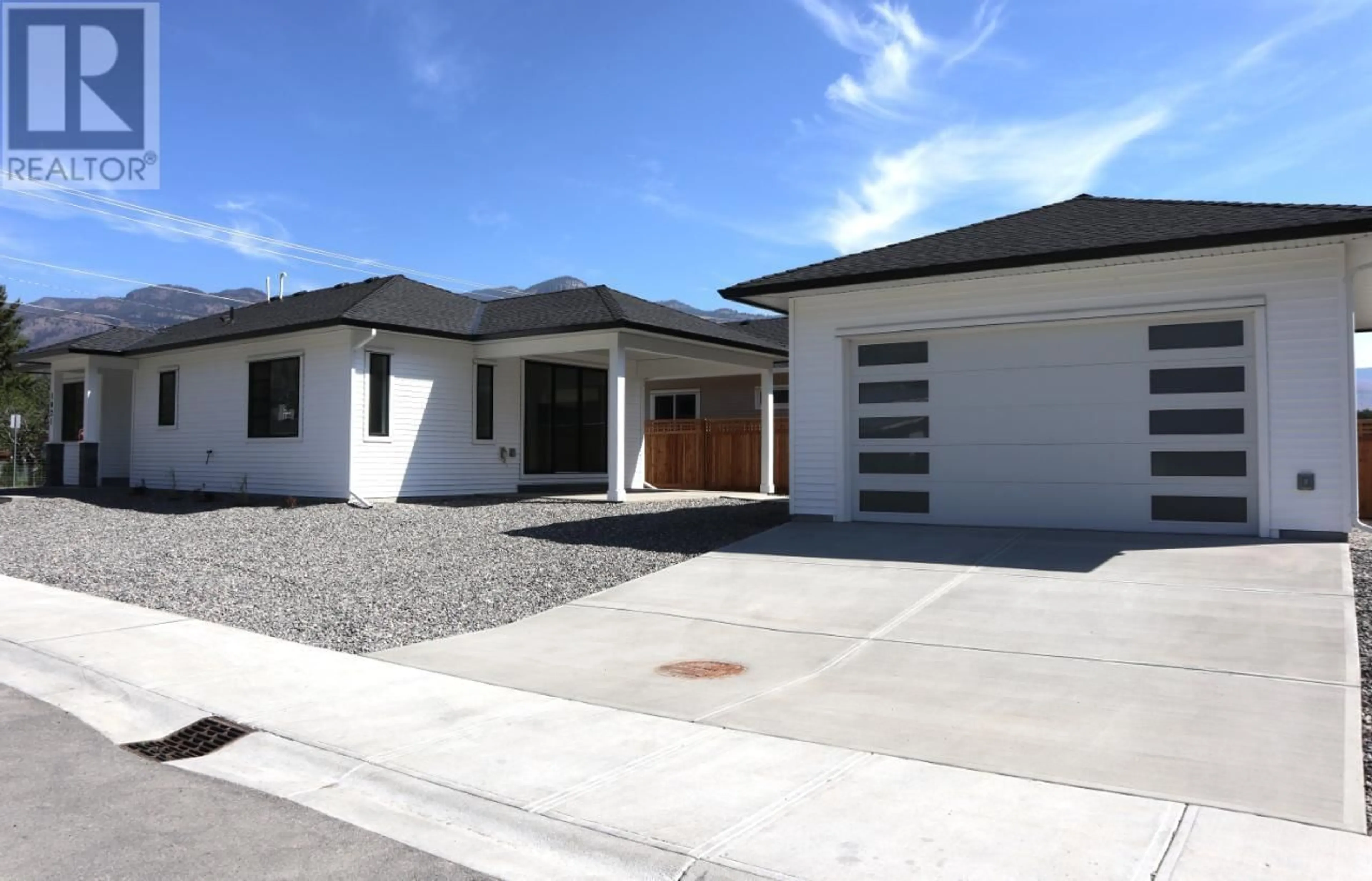 Home with vinyl exterior material, street for 1021 3RD Street, Keremeos British Columbia V0X1N3