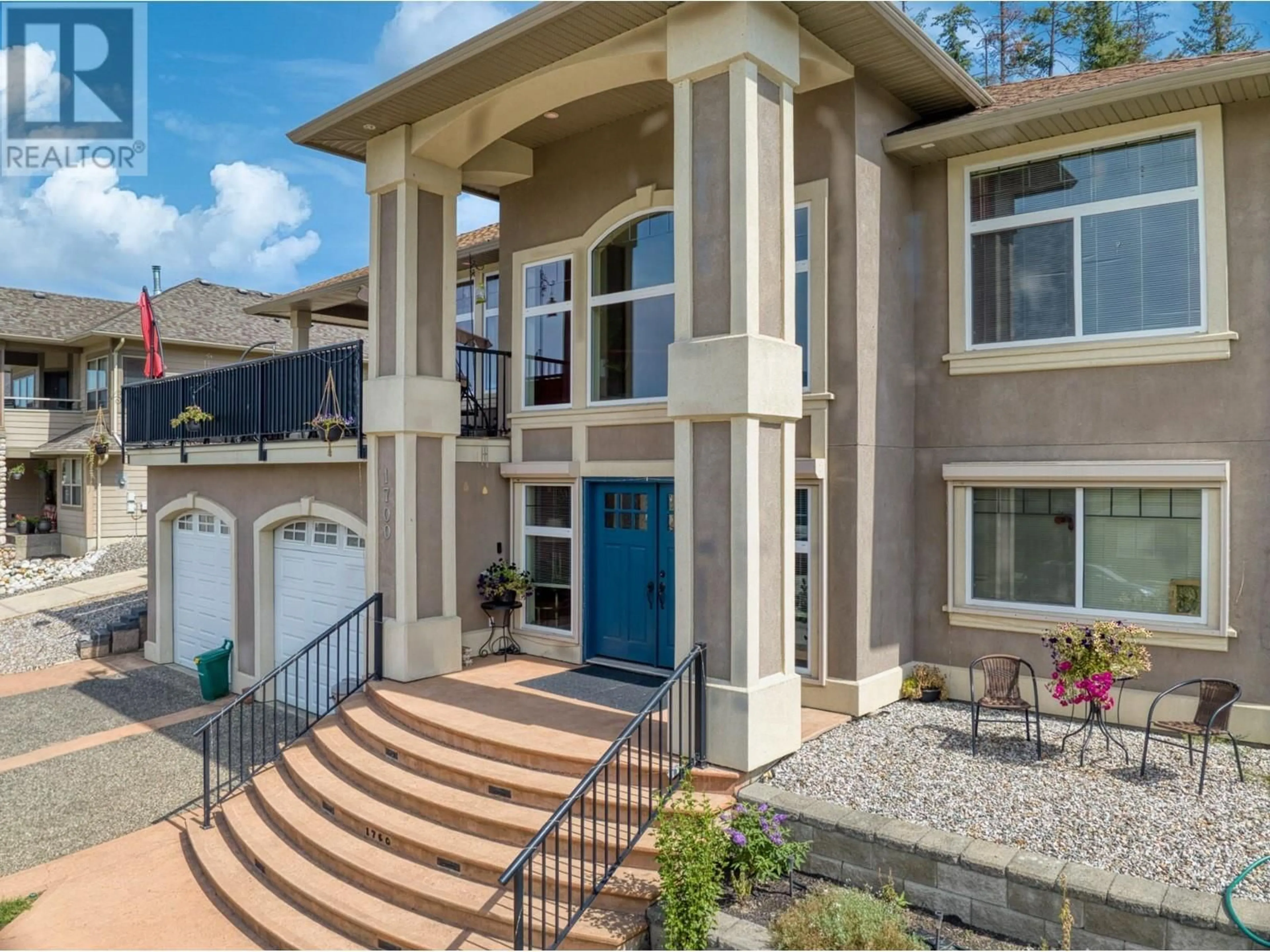 Home with vinyl exterior material, street for 1700 24 STREET NORTHEAST, Salmon Arm British Columbia V1E3M5
