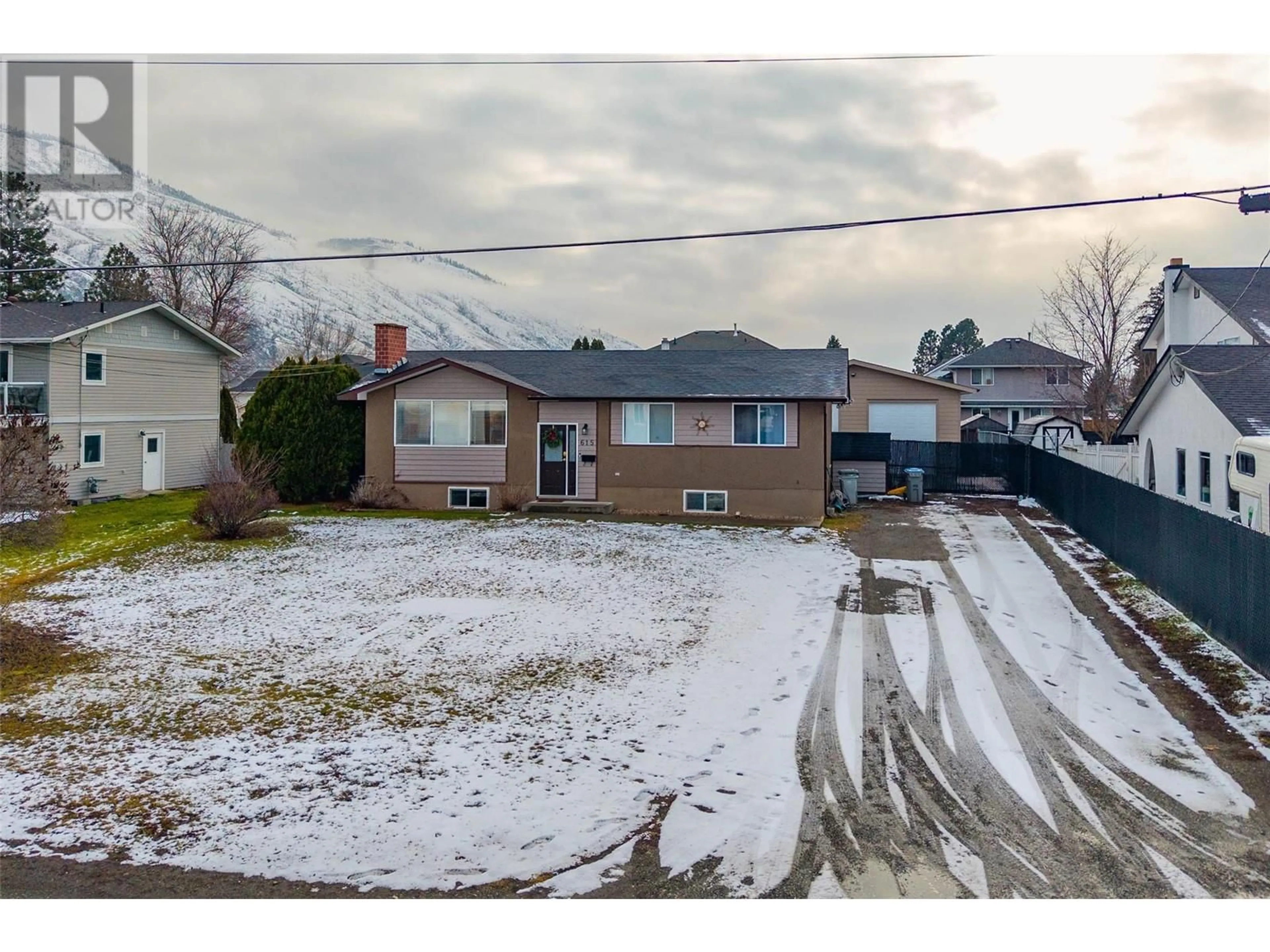 A pic from outside/outdoor area/front of a property/back of a property/a pic from drone, street for 615 Stansfield Road, Kamloops British Columbia V2B6M2