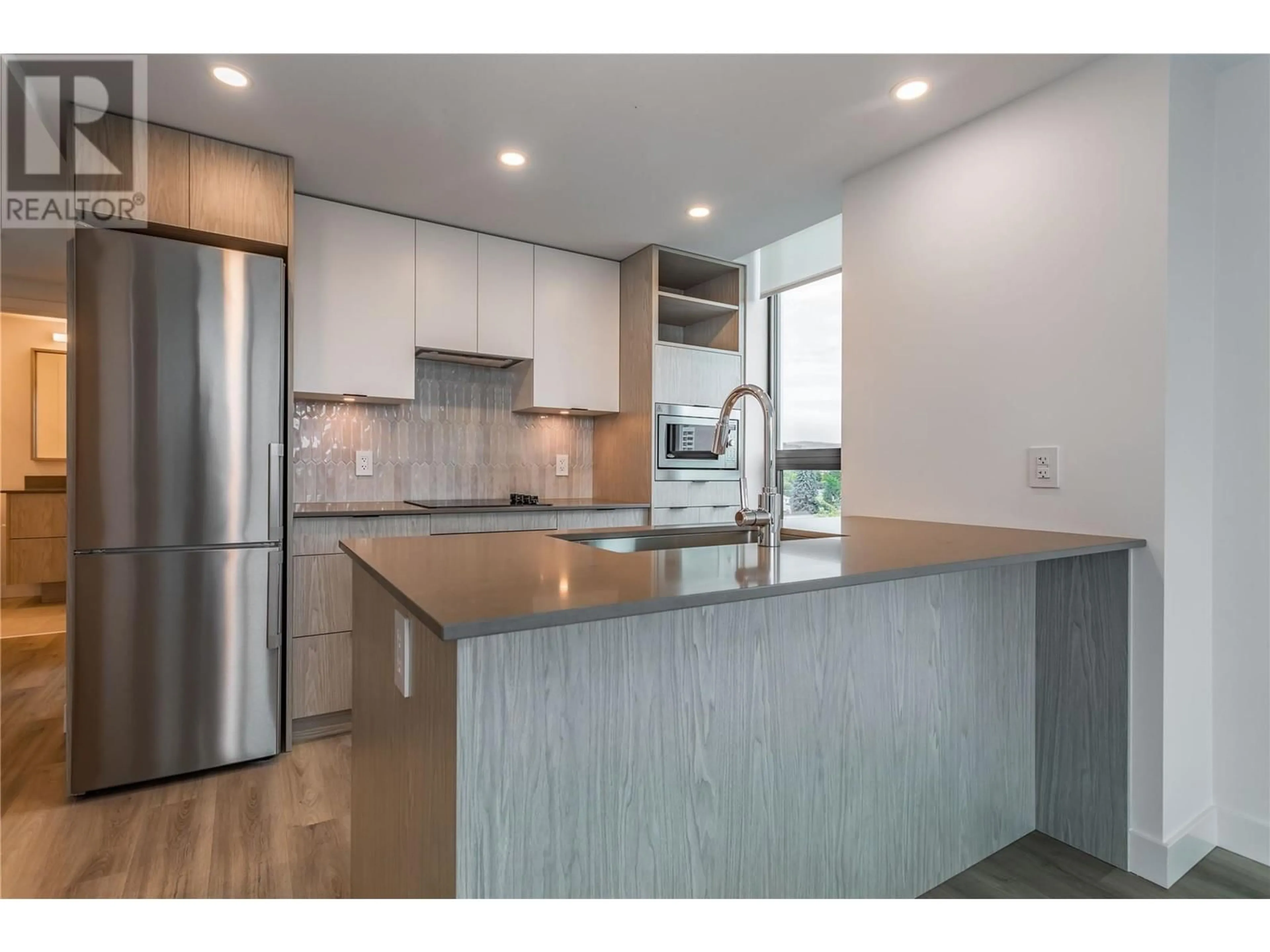 Open concept kitchen, unknown for 1488 Bertram Street Unit# 605, Kelowna British Columbia V1Y0M6