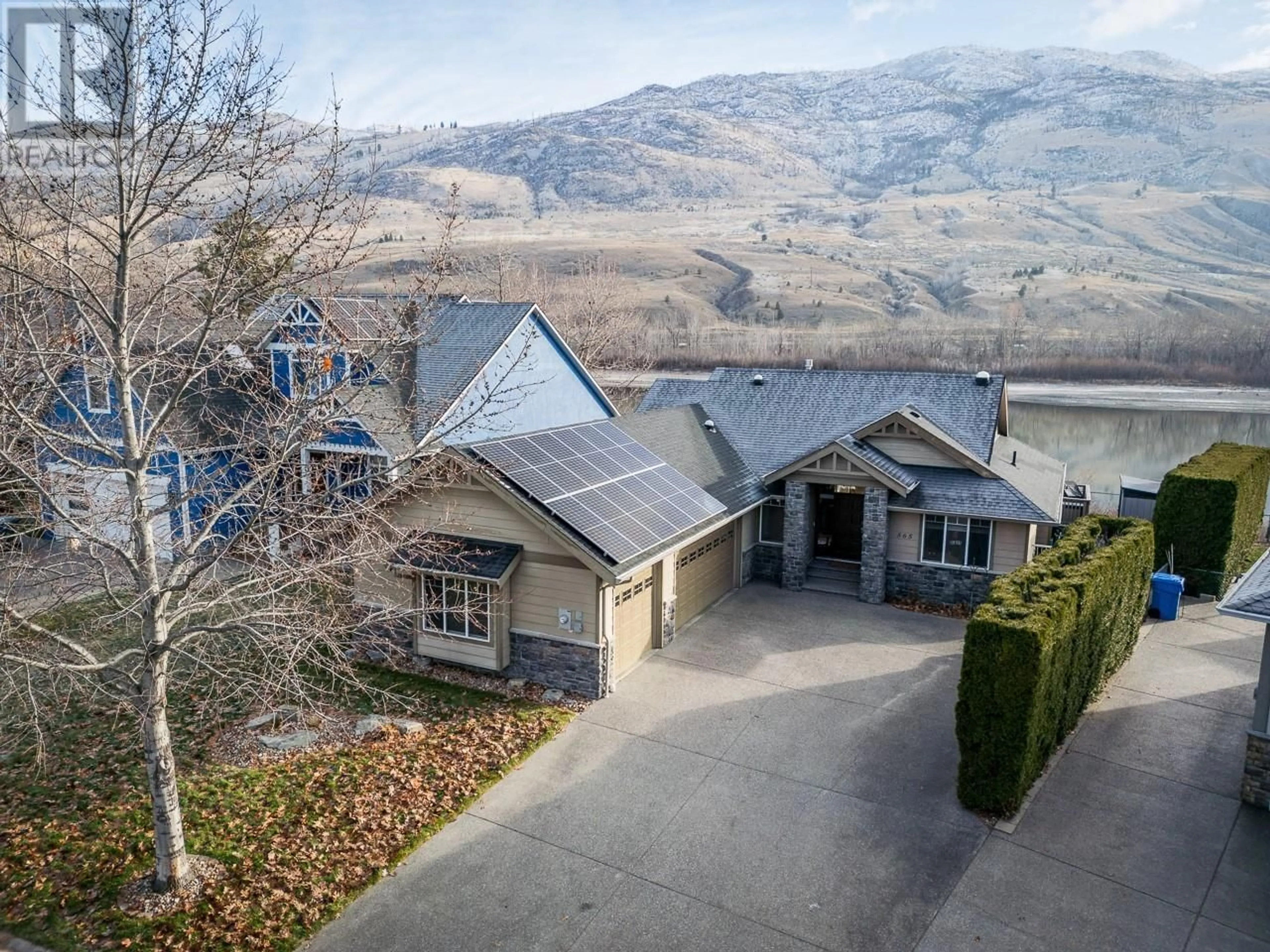 A pic from outside/outdoor area/front of a property/back of a property/a pic from drone, mountain view for 565 McCurrach Place, Kamloops British Columbia V2B8R1