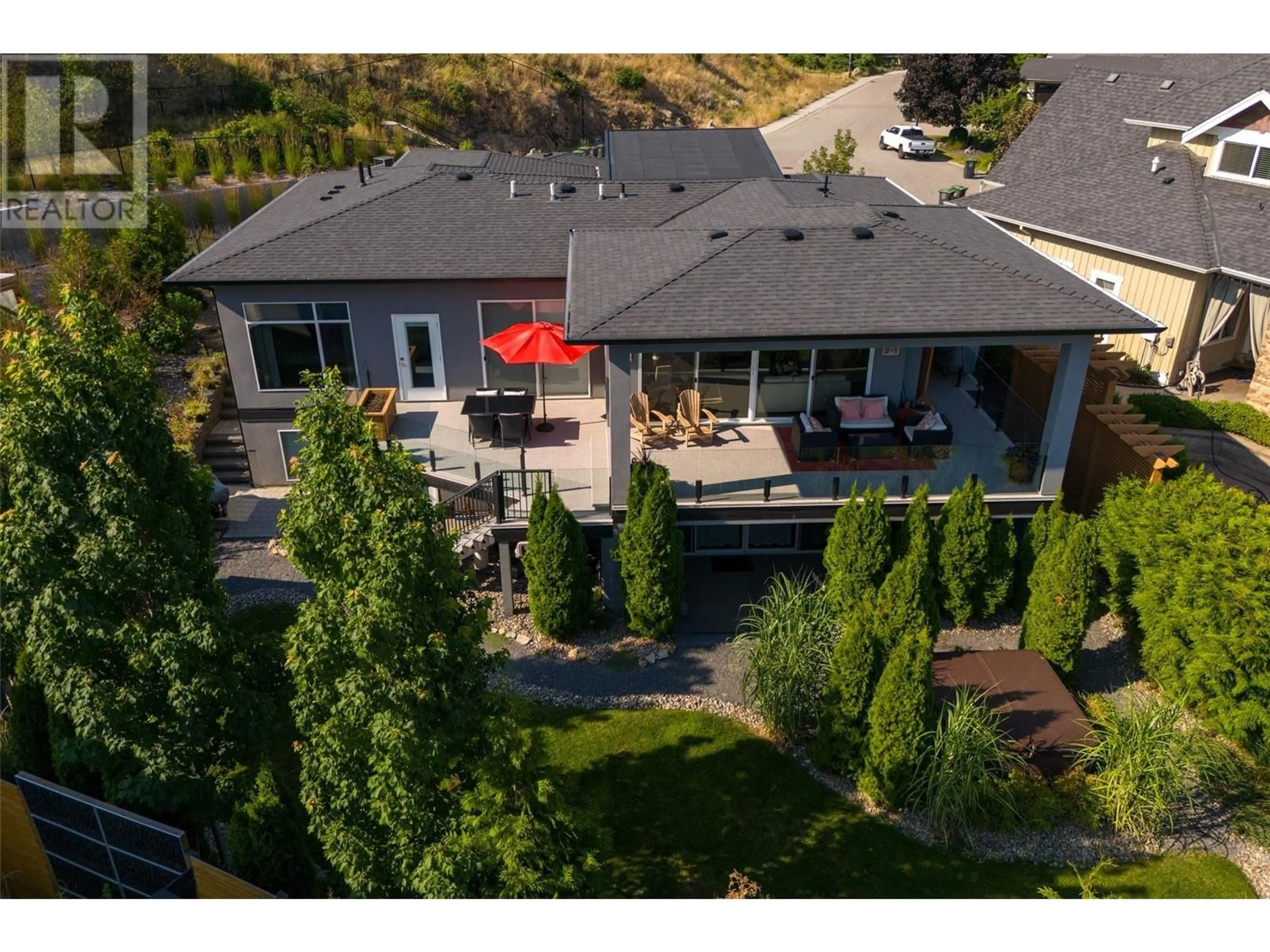 A pic from outside/outdoor area/front of a property/back of a property/a pic from drone, mountain view for 456 Cavell Place, Kelowna British Columbia V1W3A3