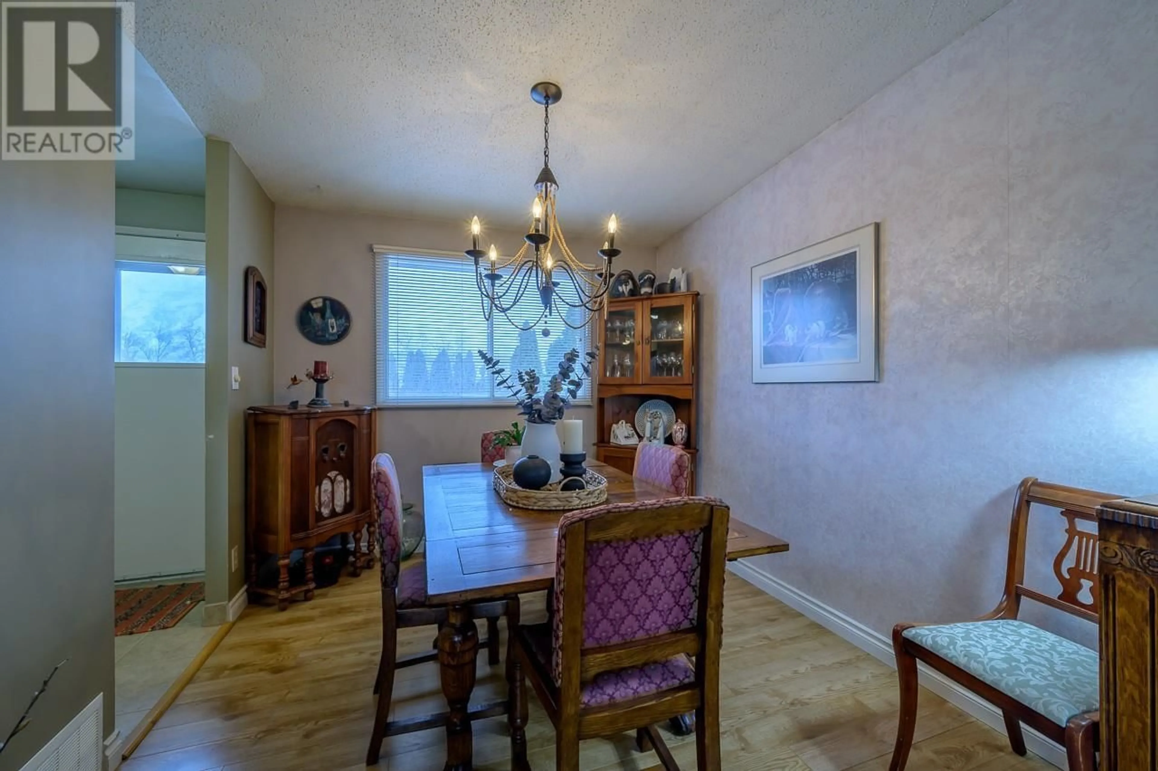 Dining room, wood/laminate floor for 2543 Sandalwood Drive, Kamloops British Columbia V2B6V3