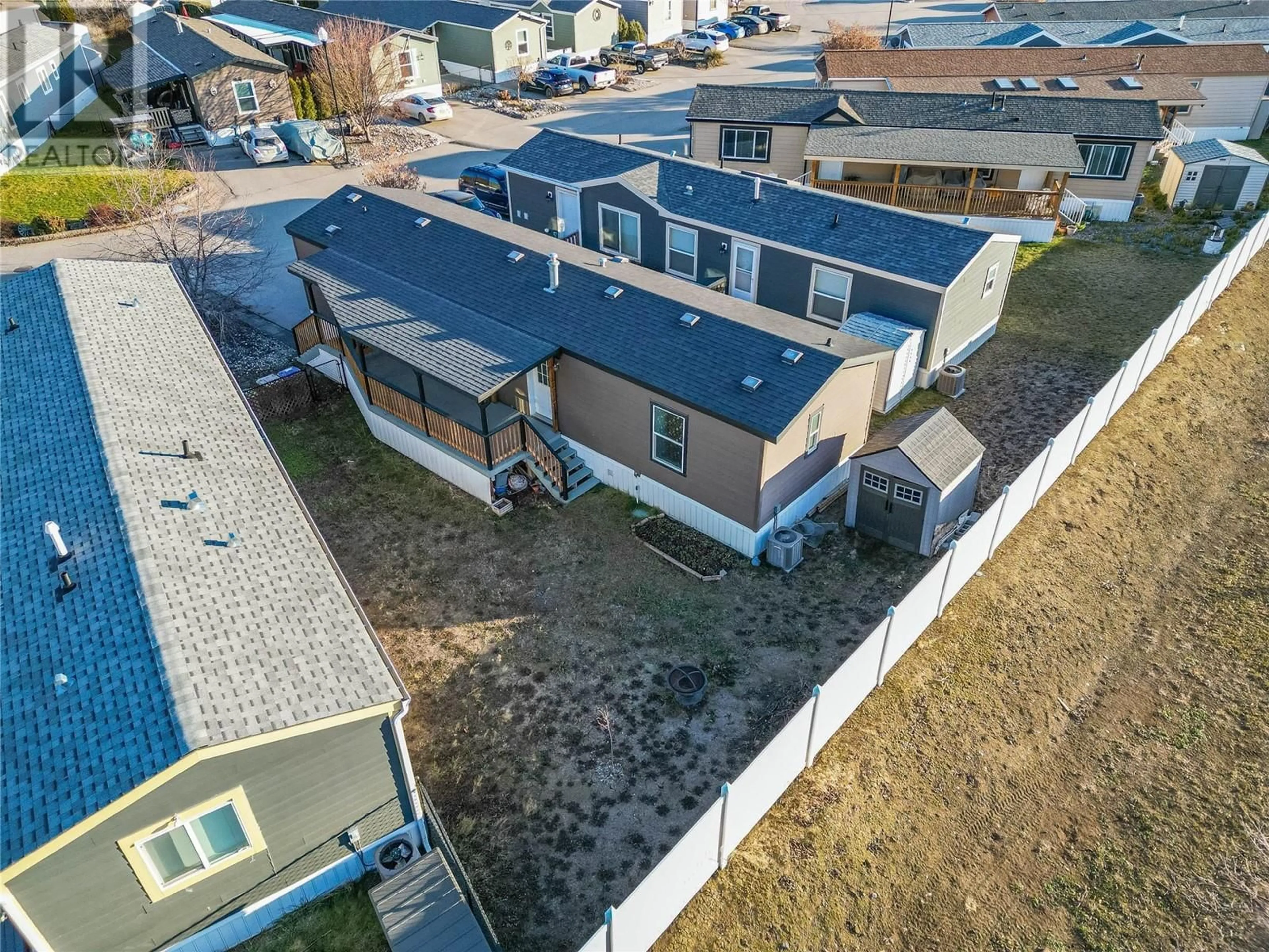 A pic from outside/outdoor area/front of a property/back of a property/a pic from drone, unknown for 8 - 1781 ORD ROAD, Kamloops British Columbia V2B0E8