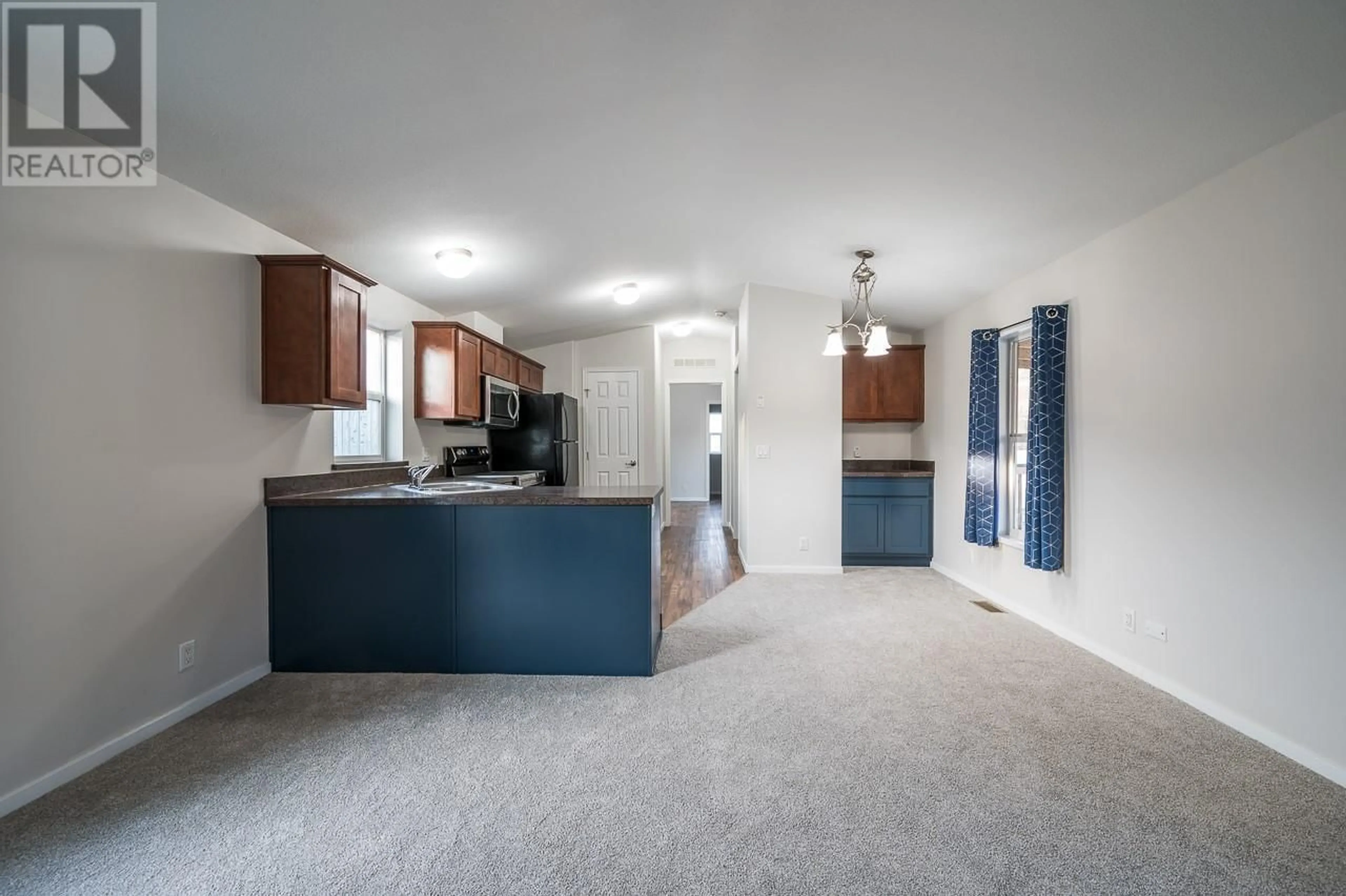 Open concept kitchen, unknown for 1781 ORD Road Unit# 8, Kamloops British Columbia V2B0E8