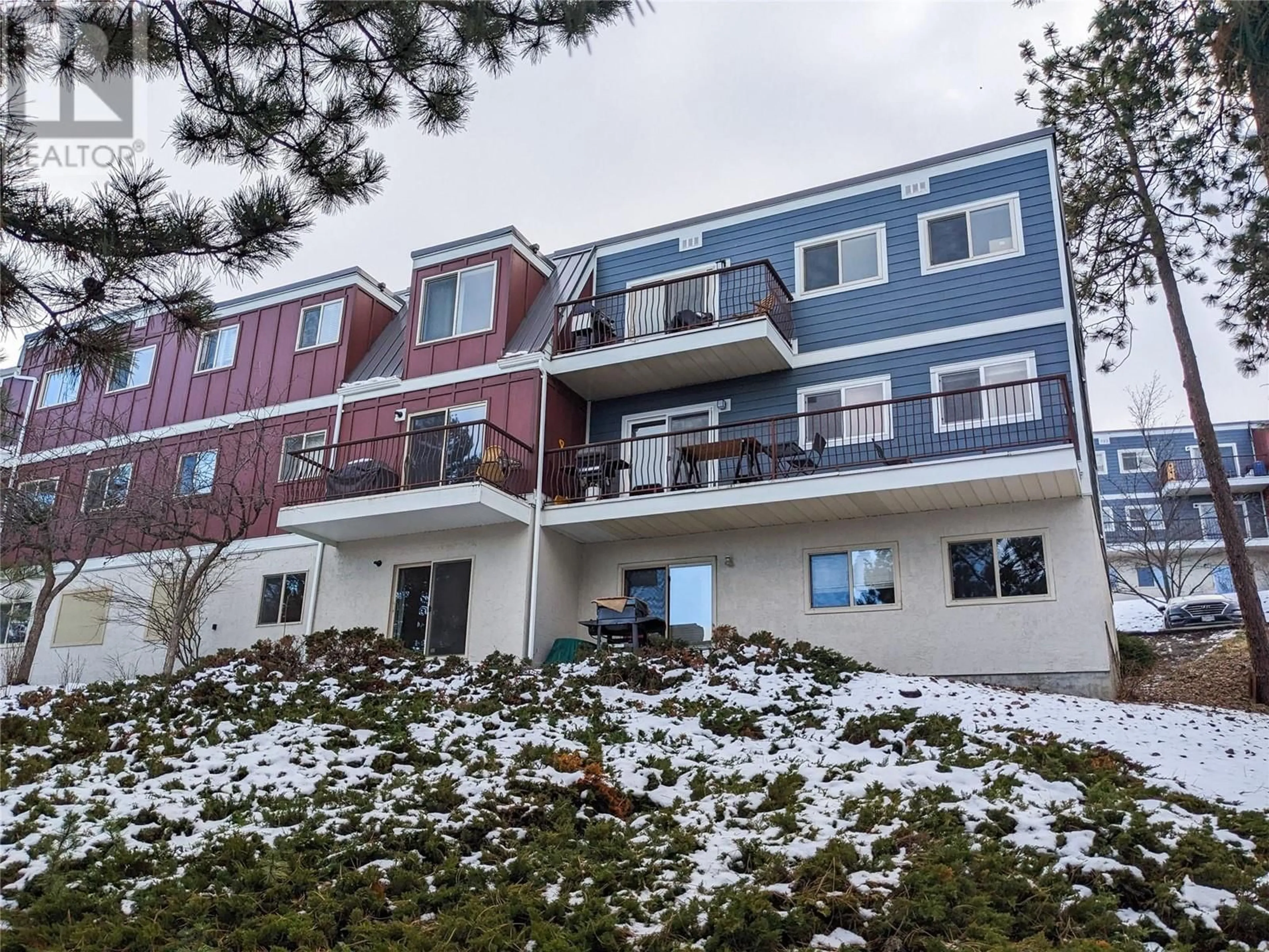 A pic from outside/outdoor area/front of a property/back of a property/a pic from drone, mountain view for 1810 SUMMIT Drive Unit# 2, Kamloops British Columbia V2E2C7