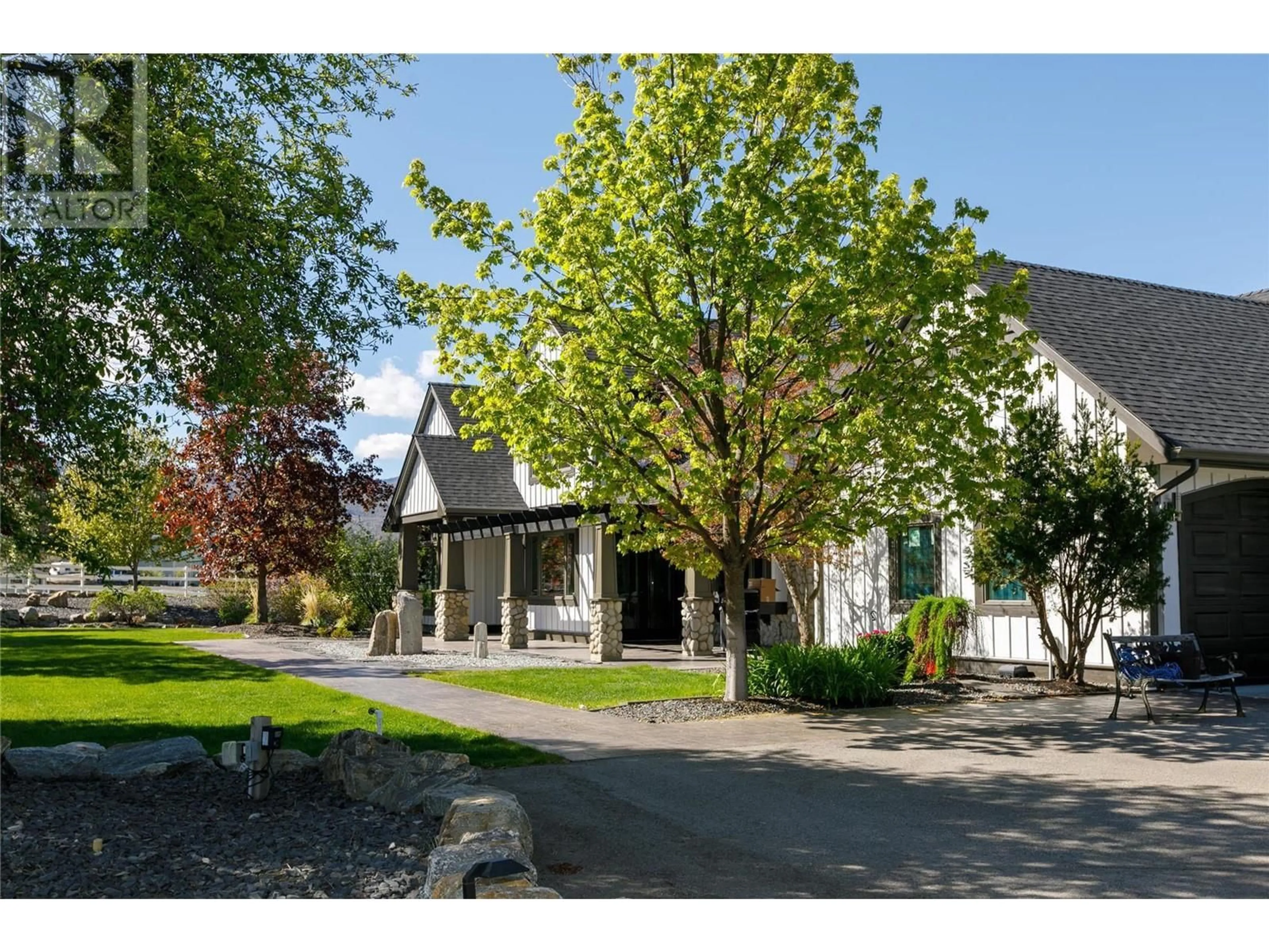 A pic from outside/outdoor area/front of a property/back of a property/a pic from drone, street for 2375 Grantham Road, Kelowna British Columbia V1W4B7