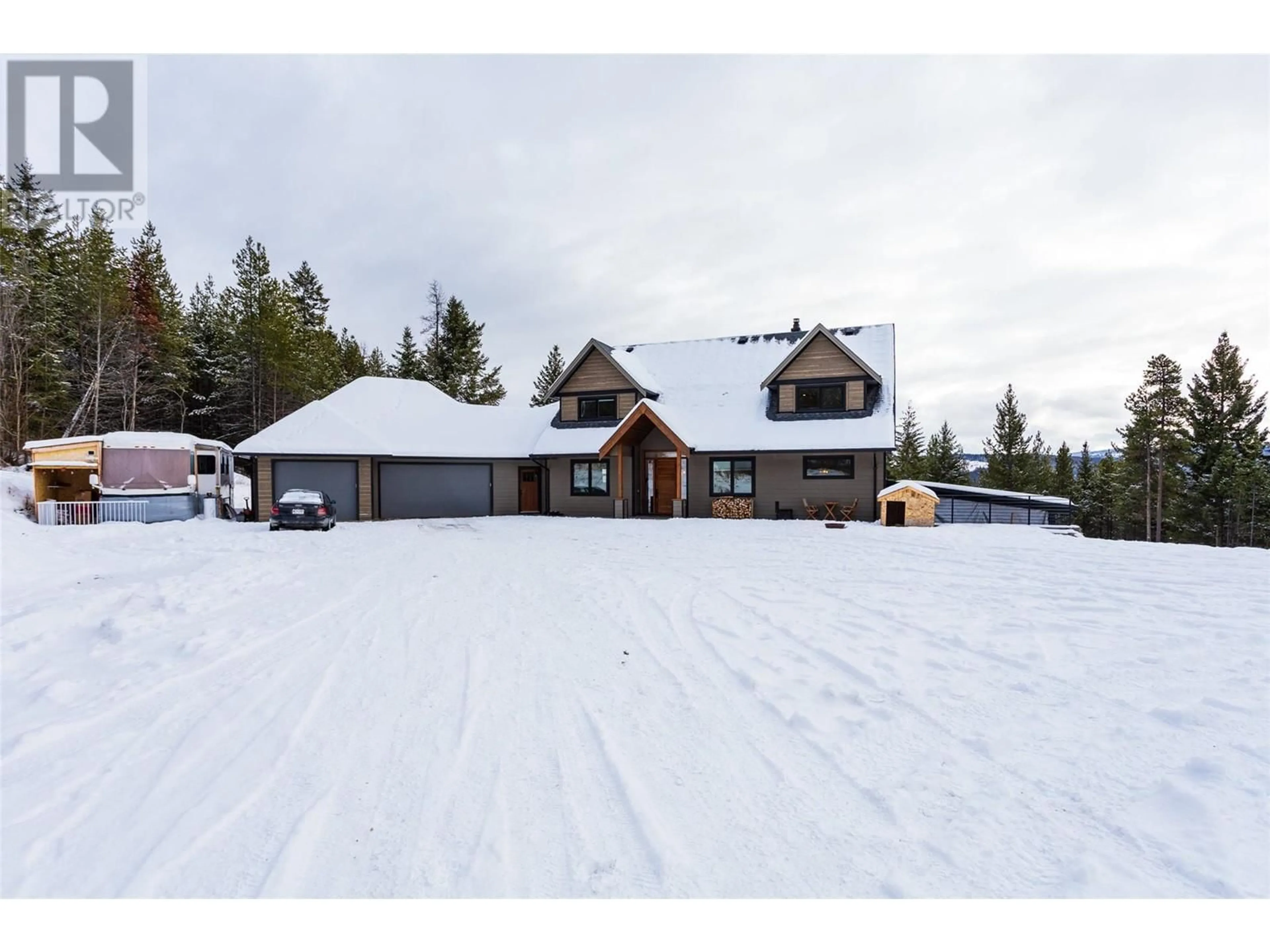 A pic from outside/outdoor area/front of a property/back of a property/a pic from drone, unknown for 1155 PRATHER Road, Kelowna British Columbia V1P1H6