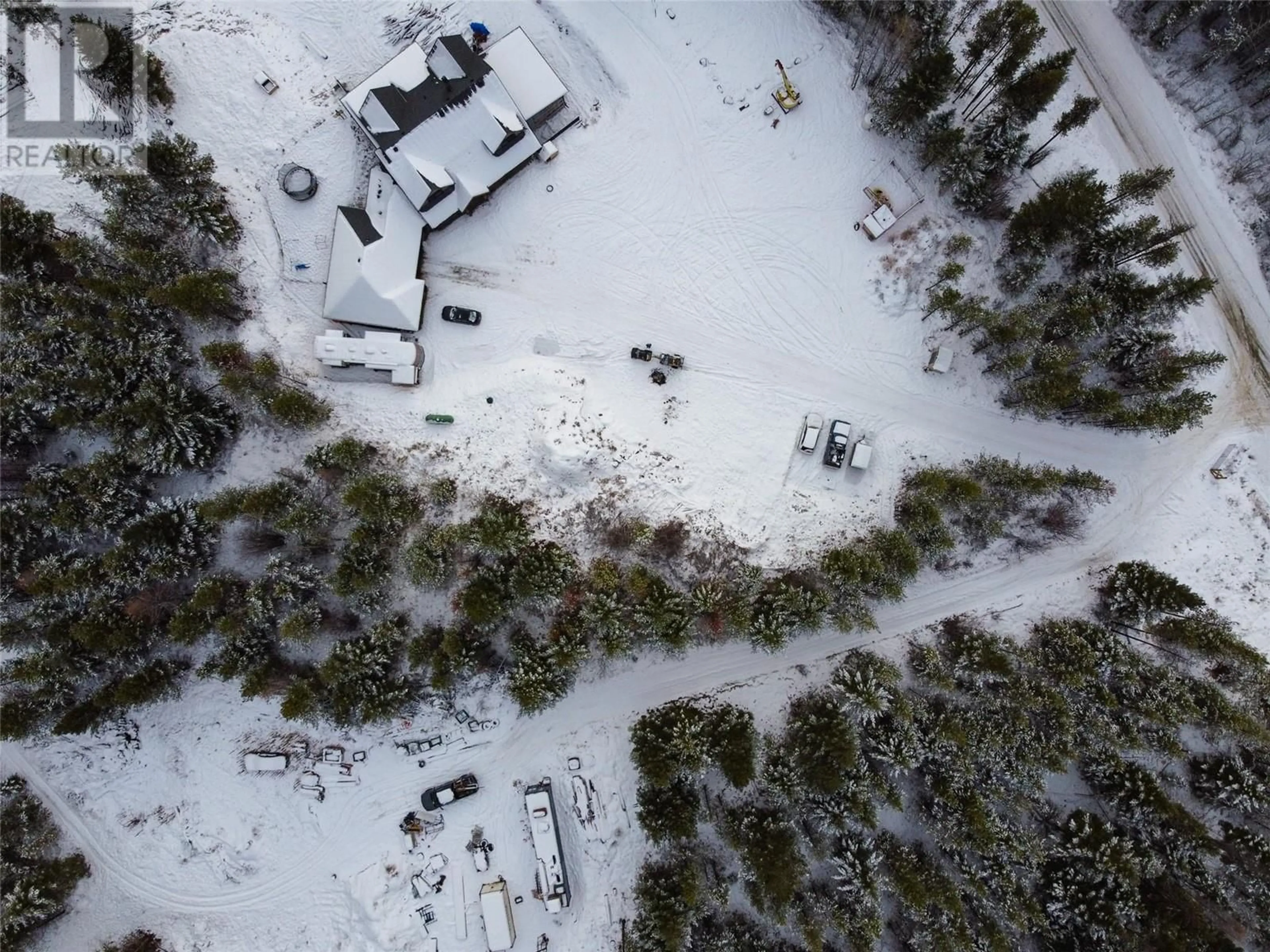 A pic from outside/outdoor area/front of a property/back of a property/a pic from drone, street for 1155 PRATHER Road, Kelowna British Columbia V1P1H6