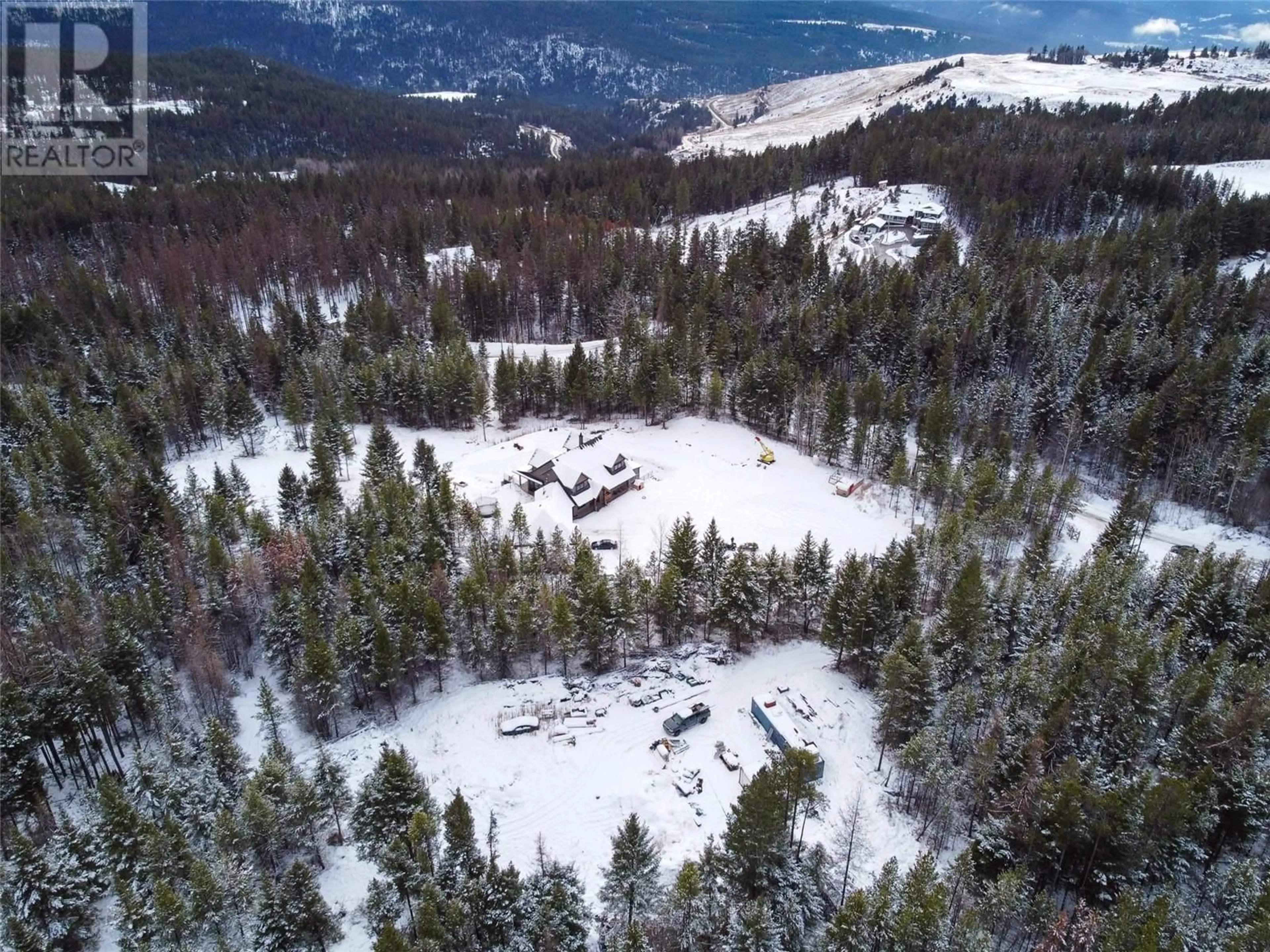 A pic from outside/outdoor area/front of a property/back of a property/a pic from drone, forest/trees view for 1155 PRATHER Road, Kelowna British Columbia V1P1H6