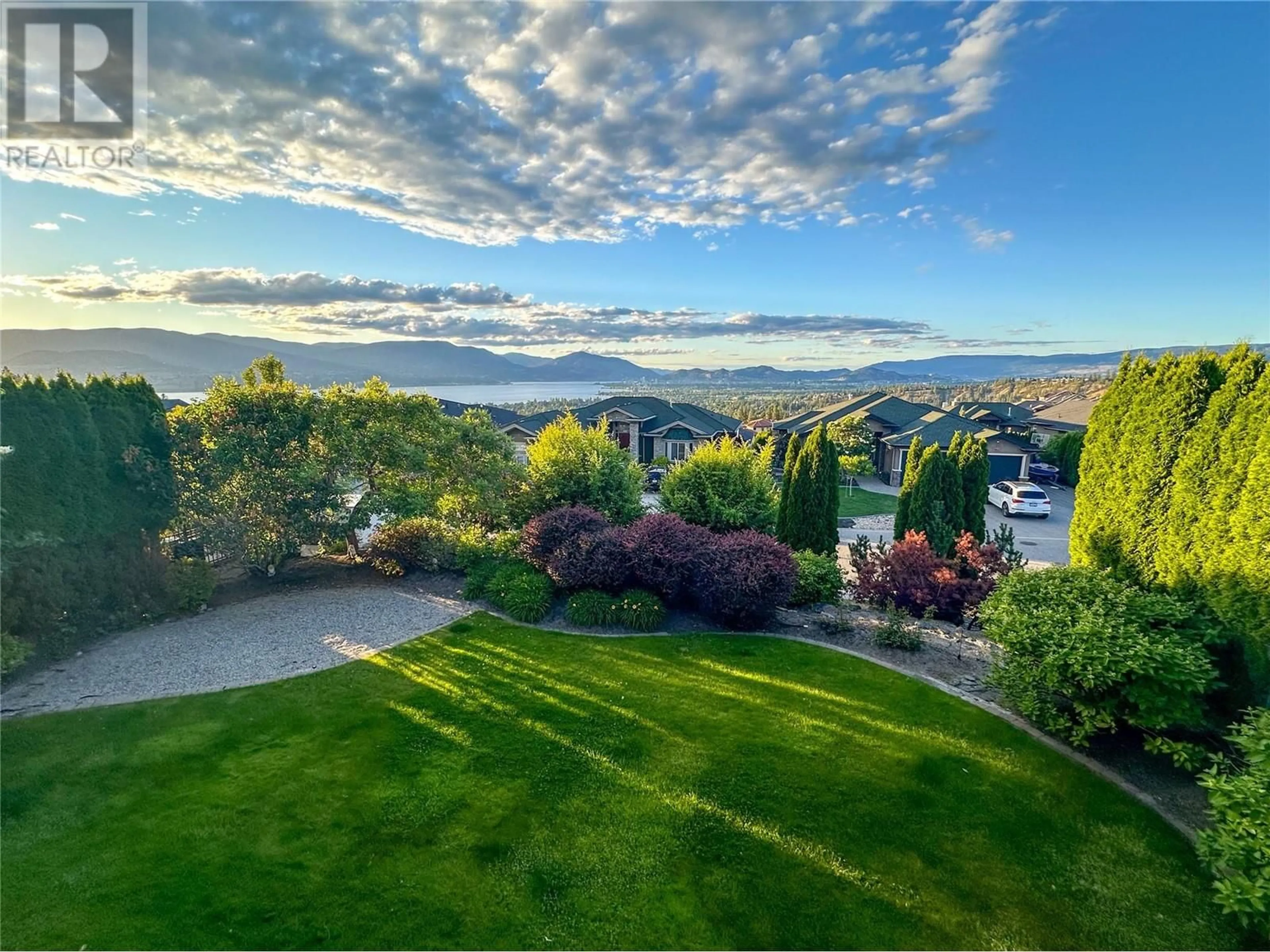 A pic from outside/outdoor area/front of a property/back of a property/a pic from drone, mountain view for 659 Arbor View Drive, Kelowna British Columbia V1W4Z7