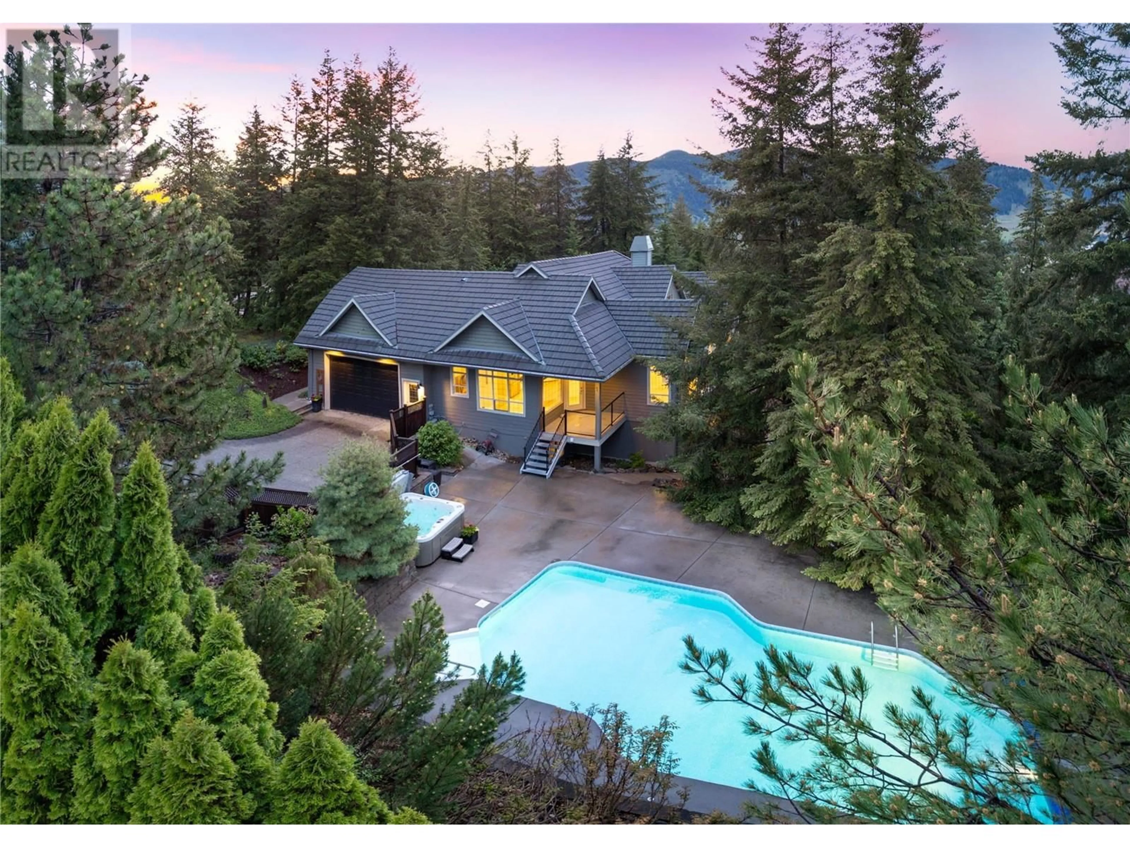 A pic from outside/outdoor area/front of a property/back of a property/a pic from drone, mountain view for 3007 Coachwood Crescent, Coldstream British Columbia V1B3Y4