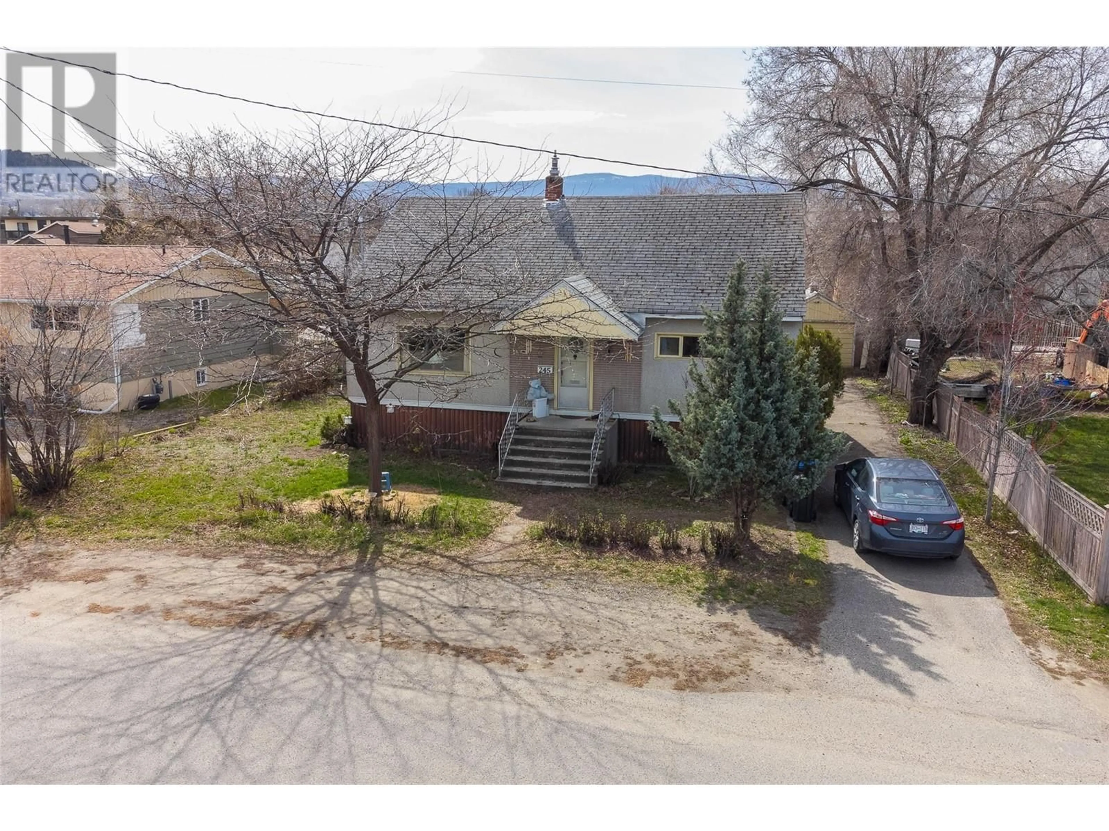 A pic from outside/outdoor area/front of a property/back of a property/a pic from drone, street for 245 Ponto Road, Kelowna British Columbia V1X2G2